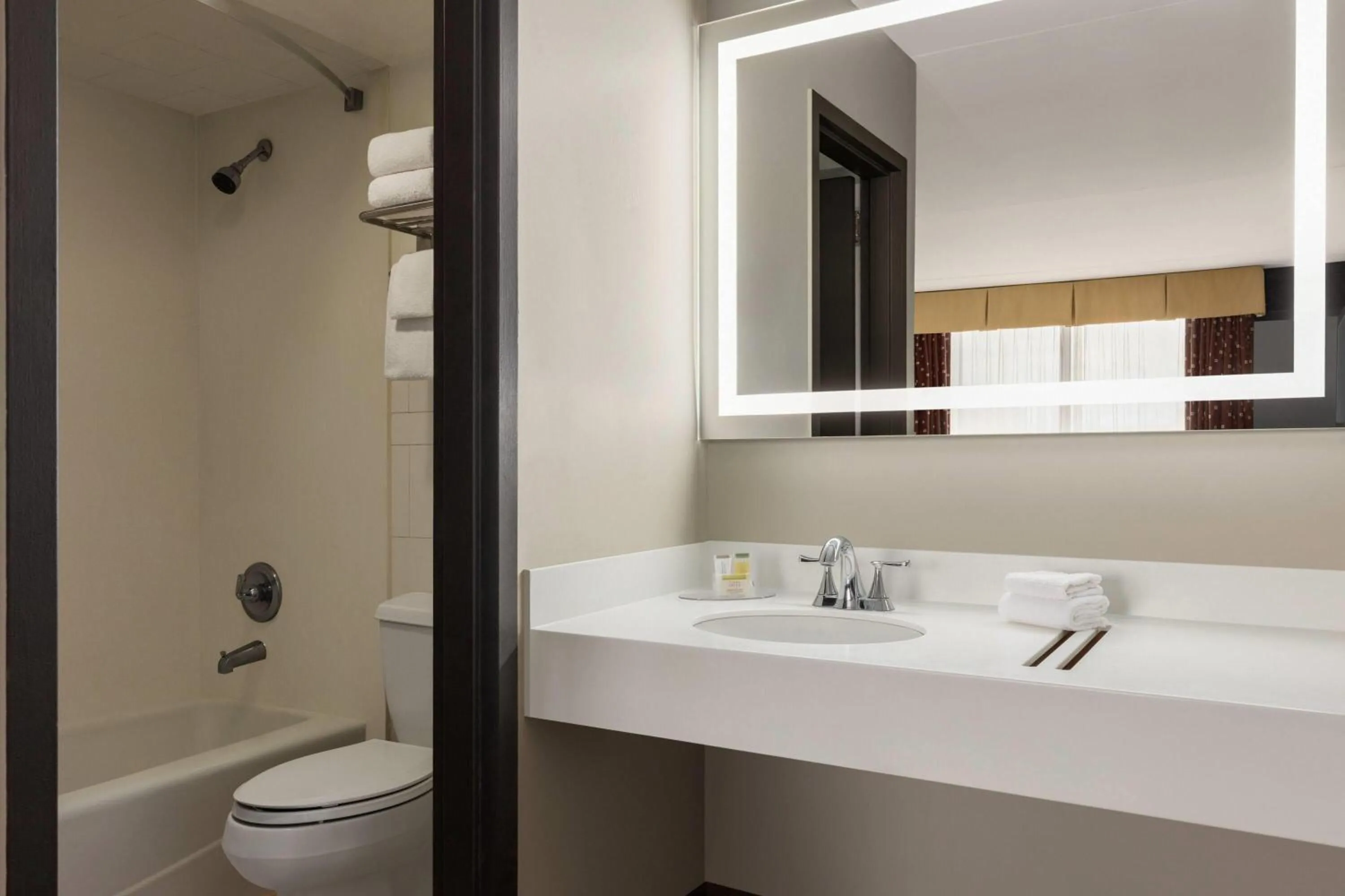 Bathroom in Super 8 by Wyndham Meadowlands