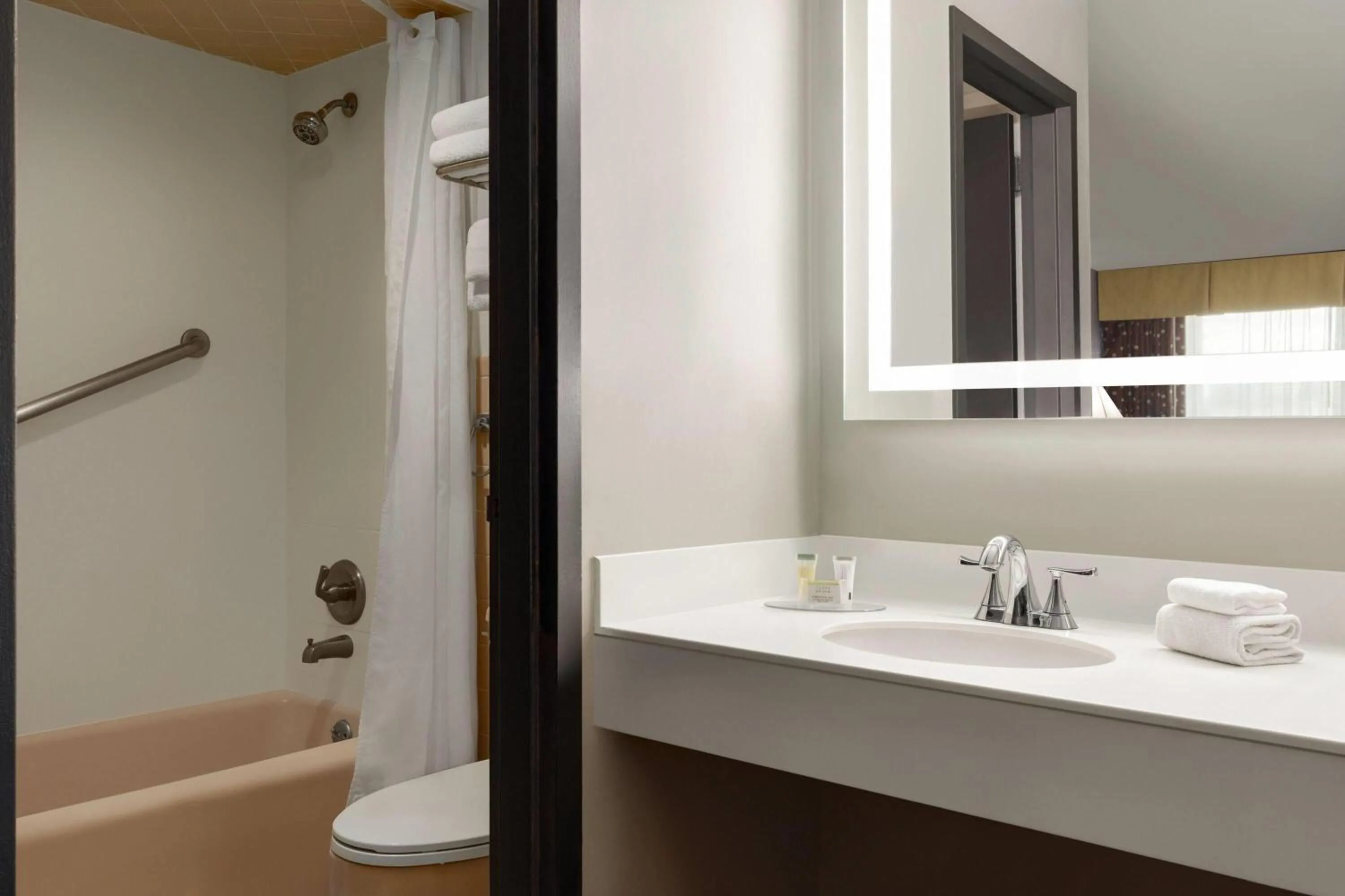 Shower in Super 8 by Wyndham Meadowlands