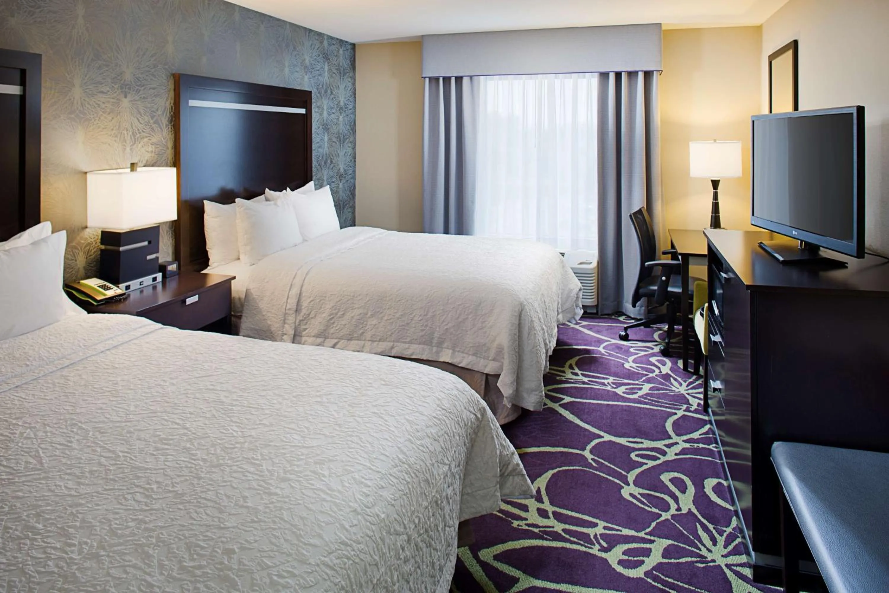 Bed in Hampton by Hilton Lansing West
