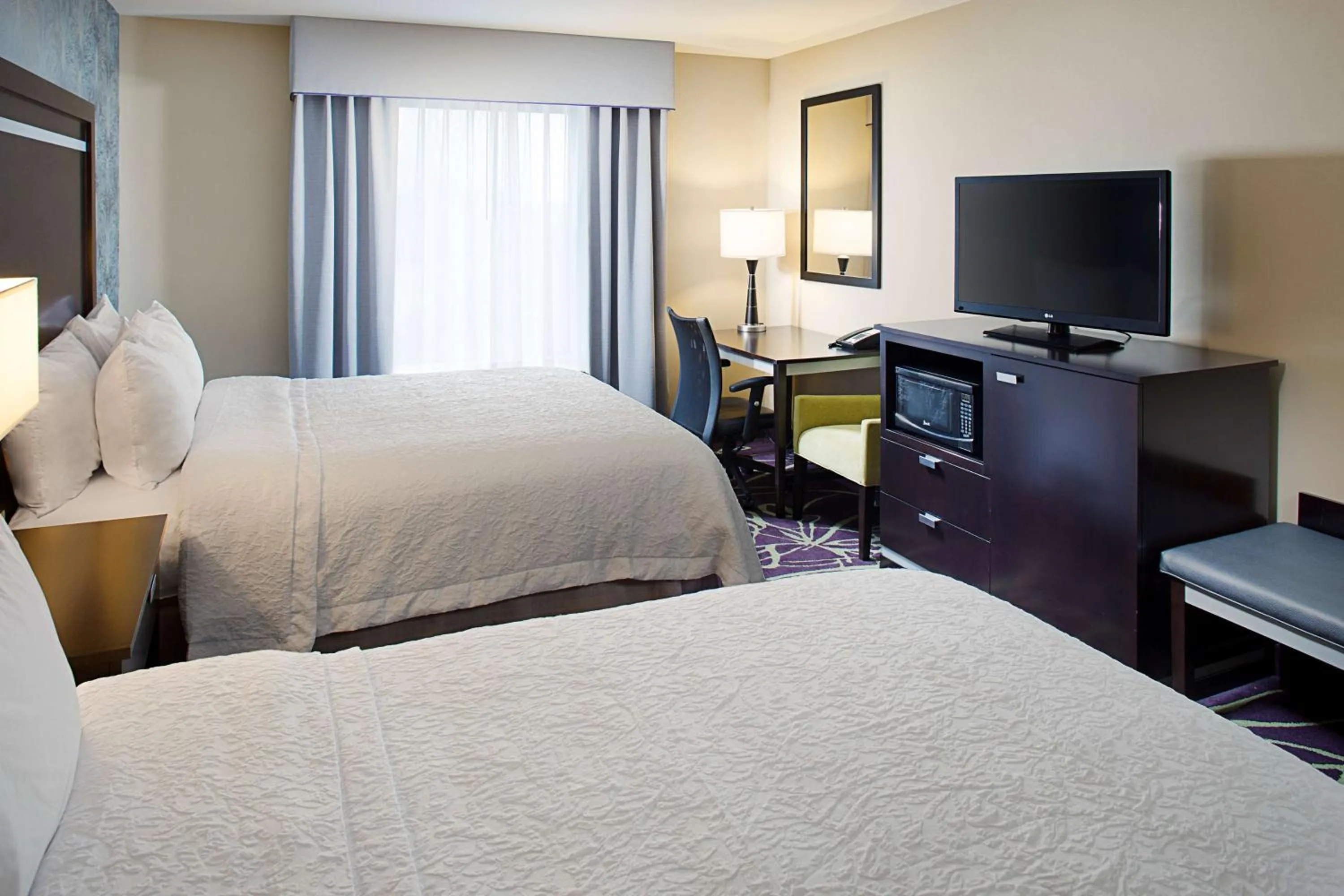 Bed in Hampton by Hilton Lansing West