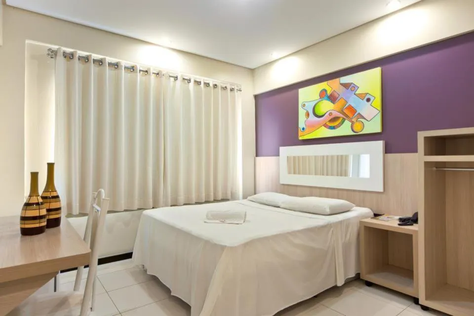 Photo of the whole room, Bed in Eunapolis Plaza Hotel