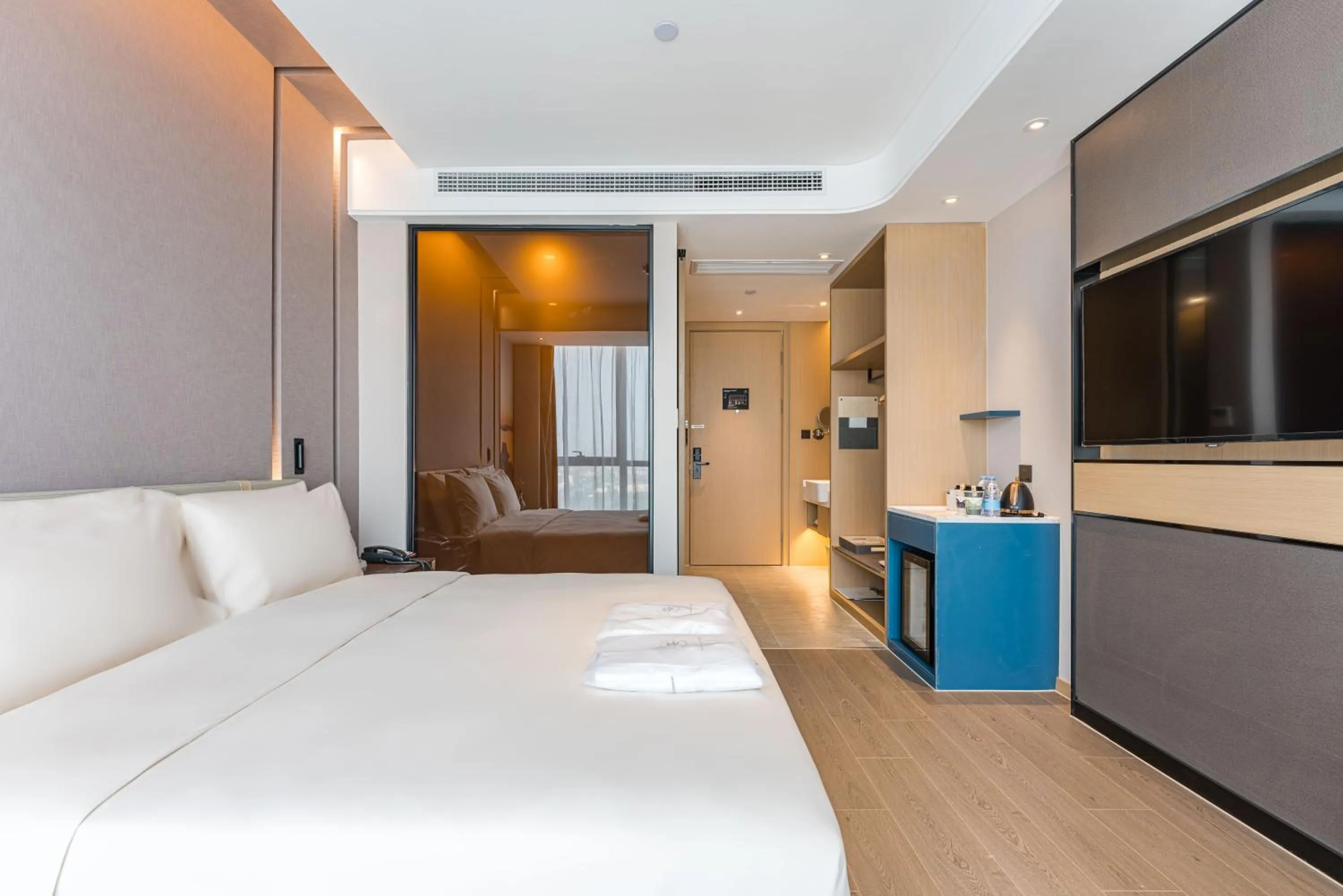 Bed in Atour Hotel Suzhou Wangting