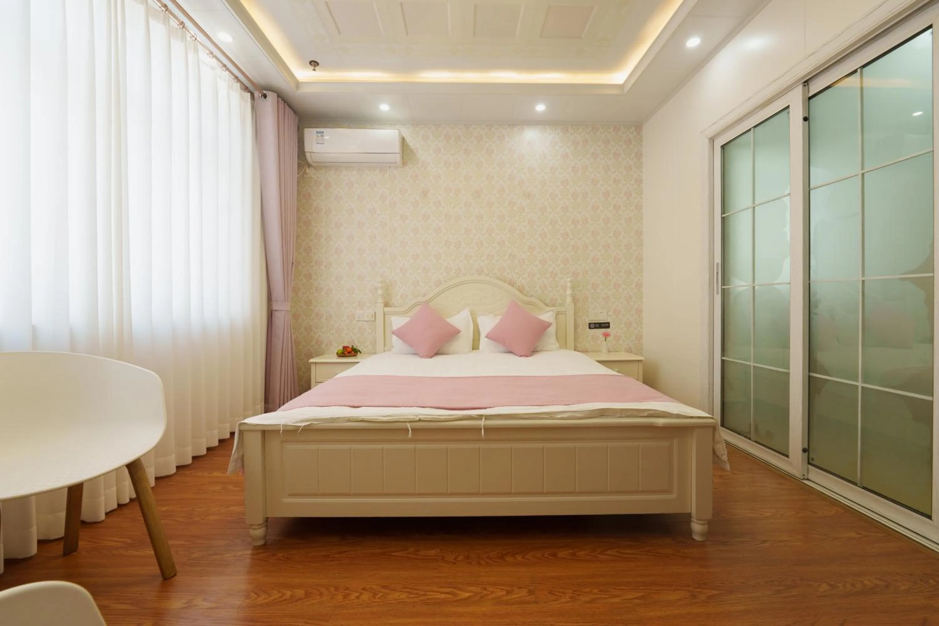 Bed in Floral Yilanxuan Zhouzhuang Hotel