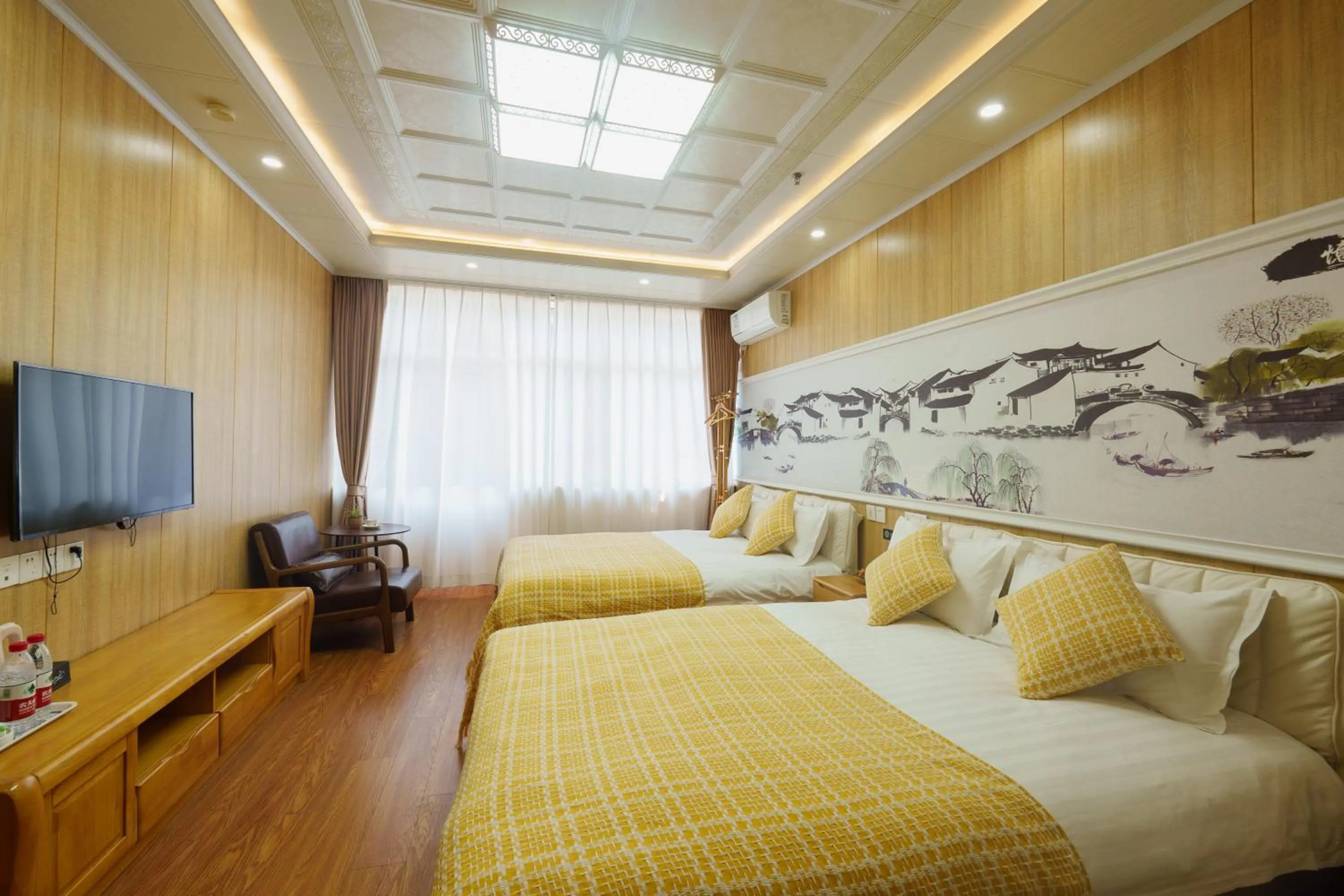 Bed in Floral Yilanxuan Zhouzhuang Hotel