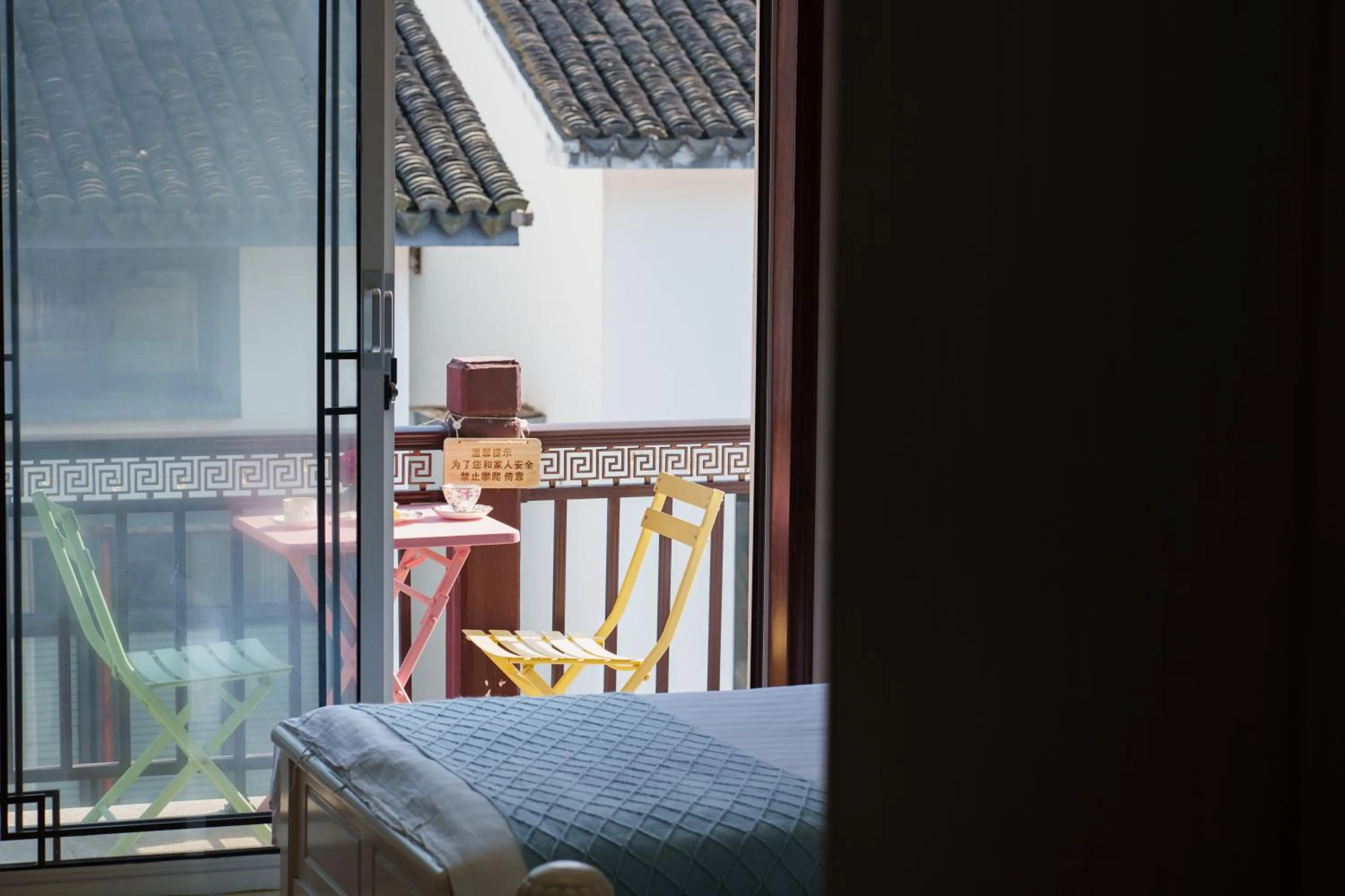 Bed in Floral Yilanxuan Zhouzhuang Hotel