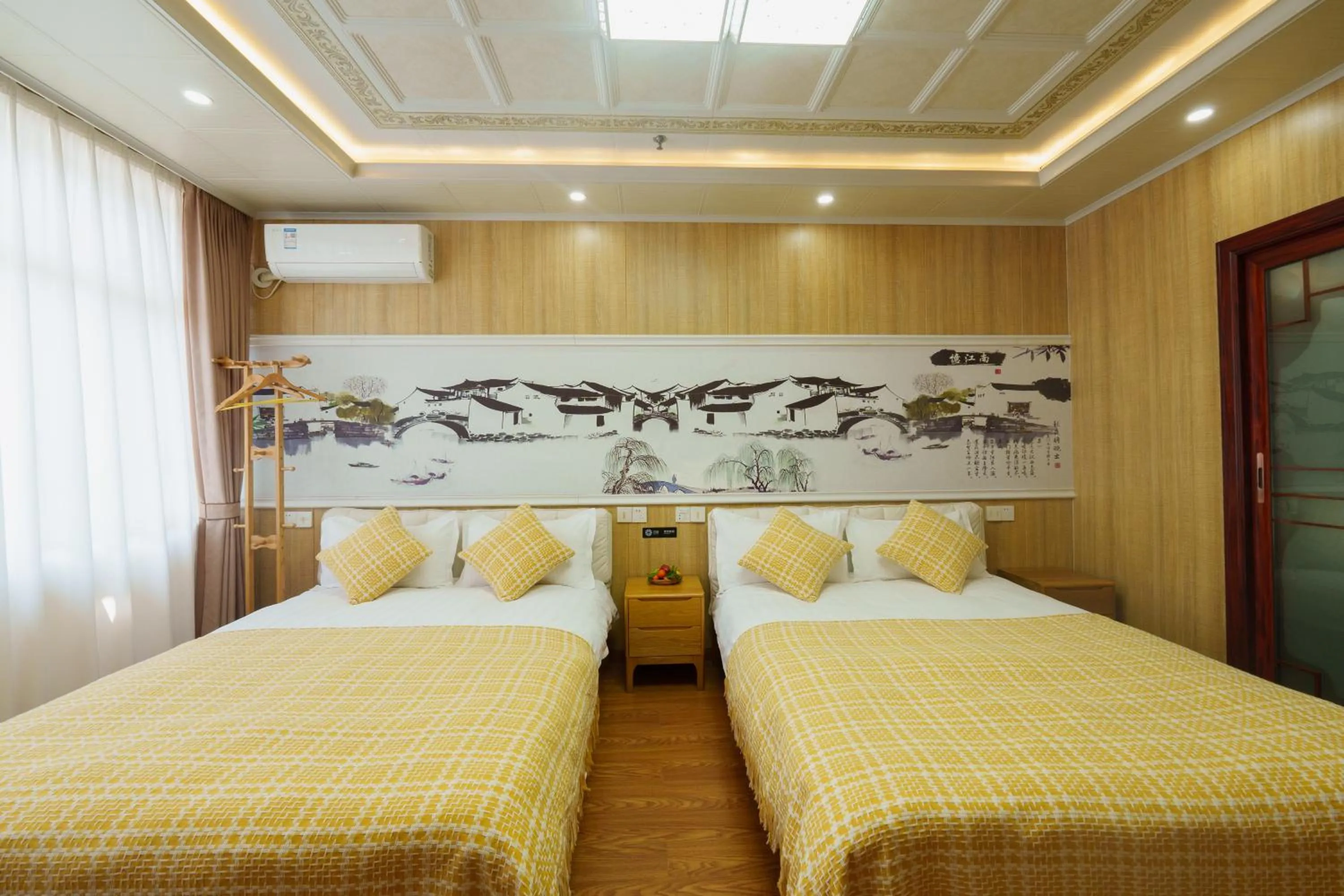 Bed in Floral Yilanxuan Zhouzhuang Hotel