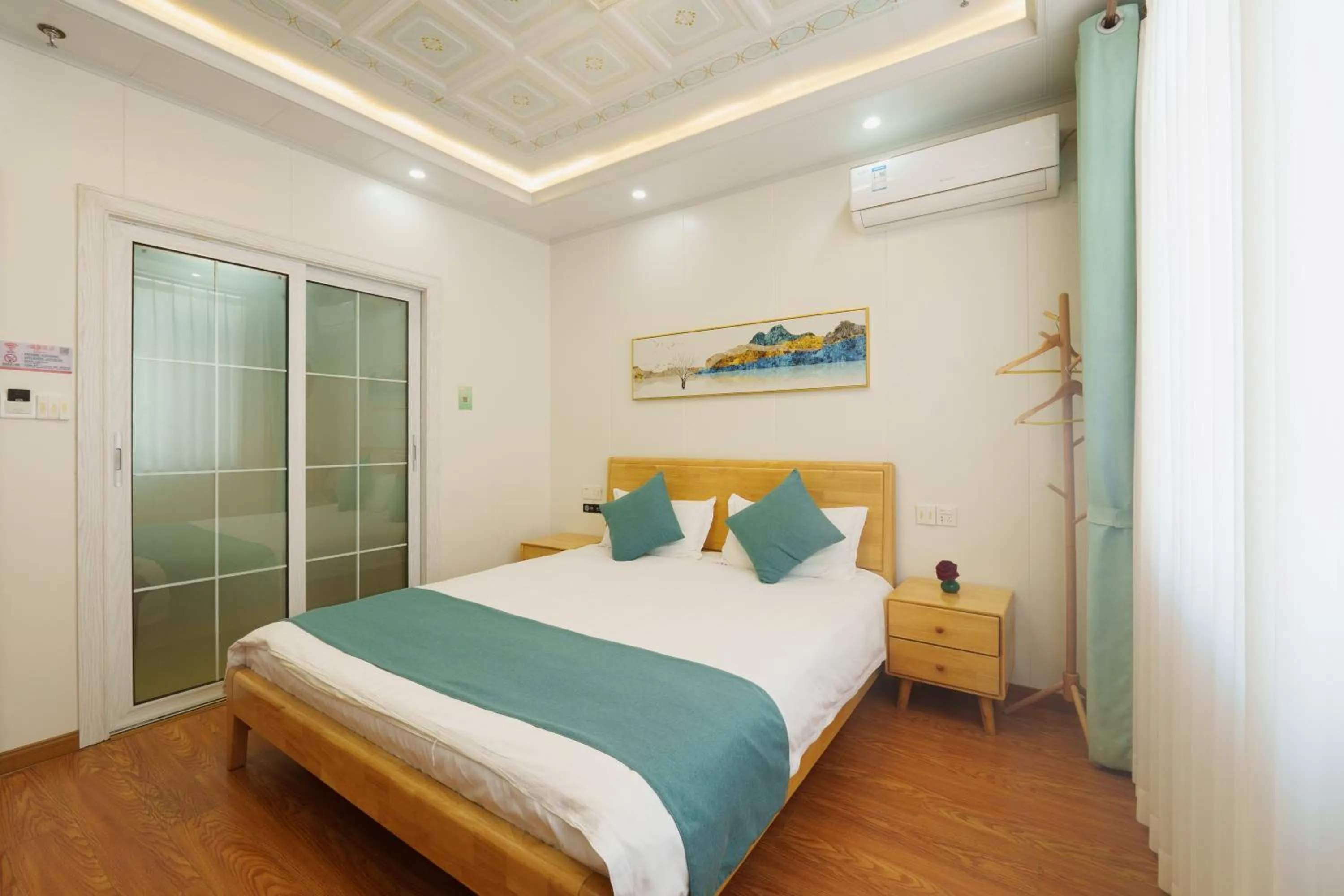 Bed in Floral Yilanxuan Zhouzhuang Hotel