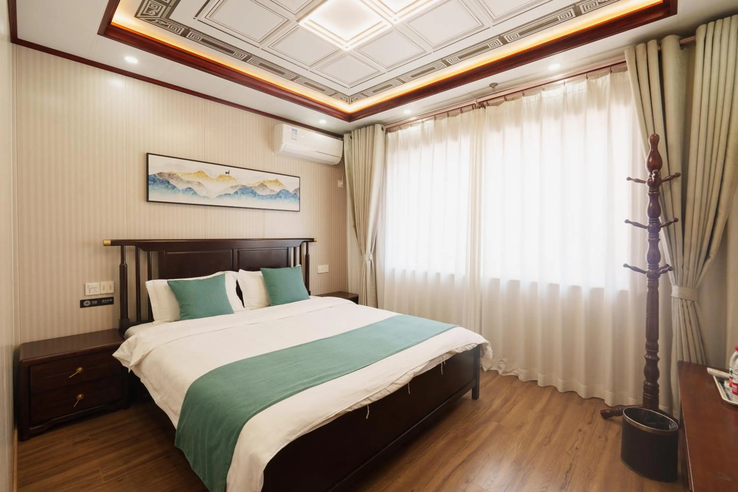 Bed in Floral Yilanxuan Zhouzhuang Hotel