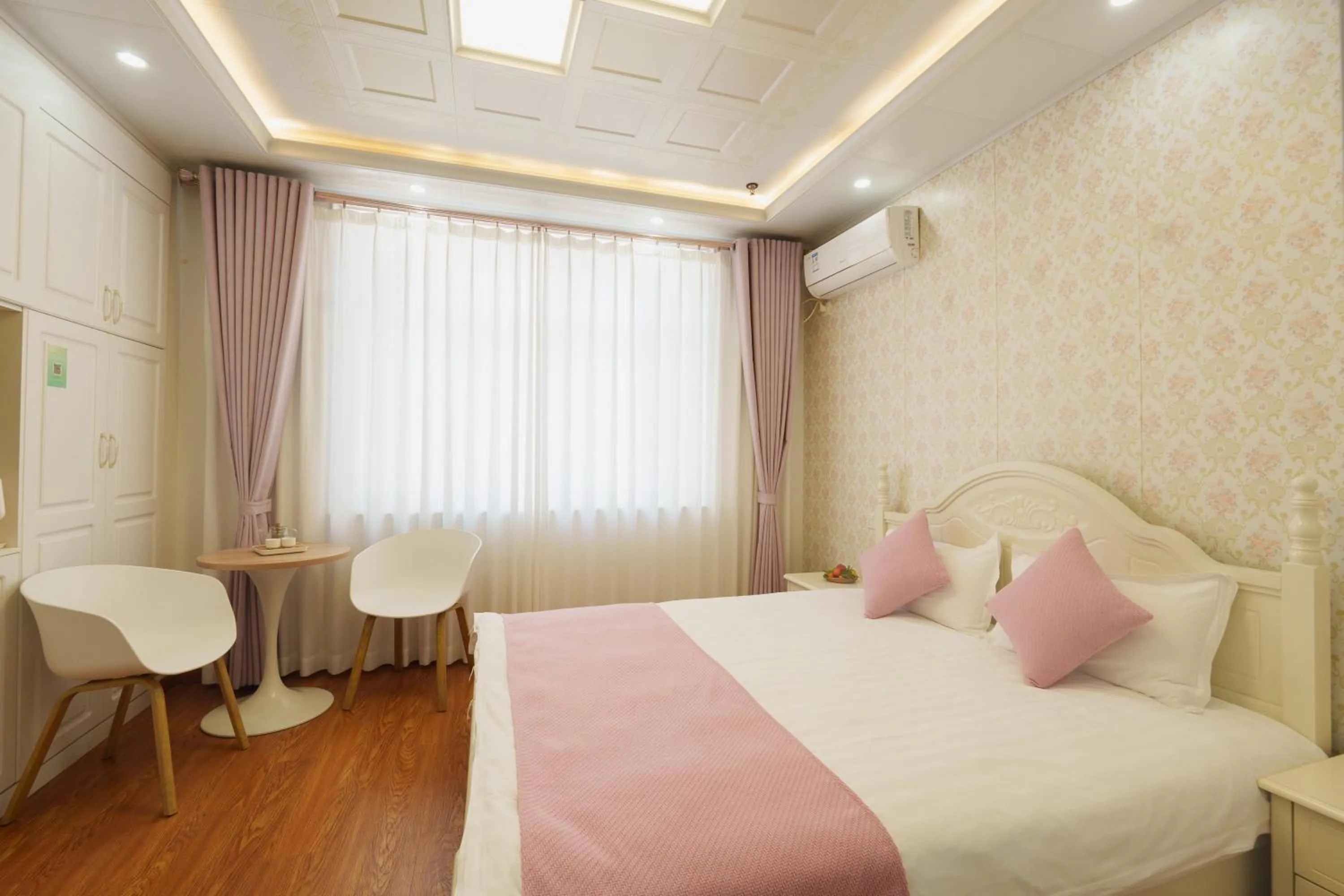 Bed in Floral Yilanxuan Zhouzhuang Hotel