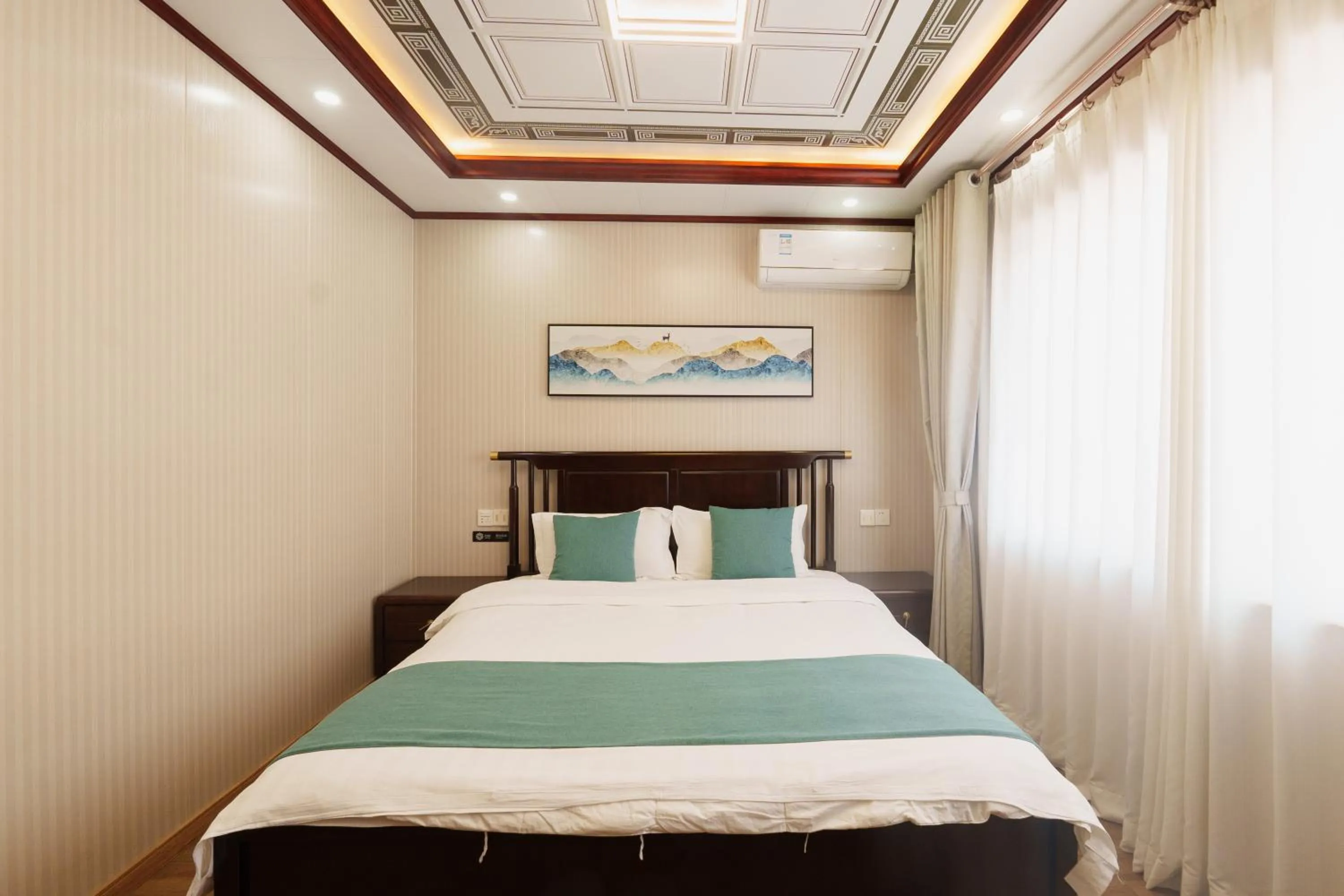 Bed in Floral Yilanxuan Zhouzhuang Hotel