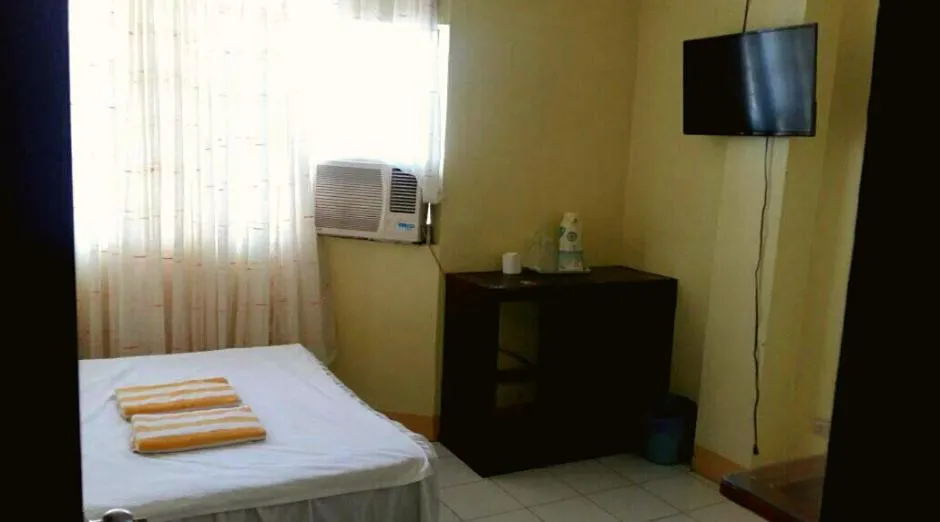 Bed in JR Pension House