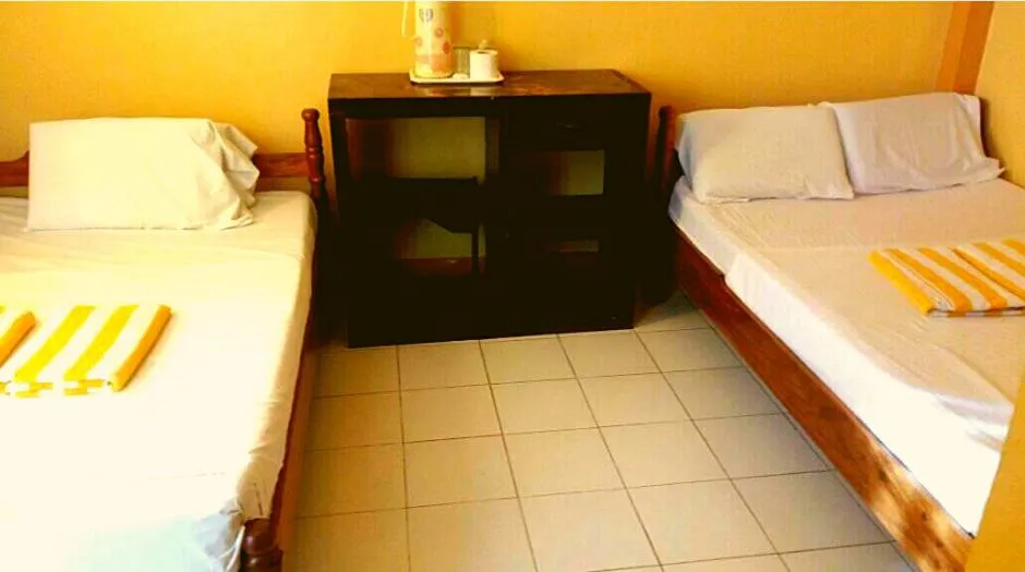 Bed in JR Pension House