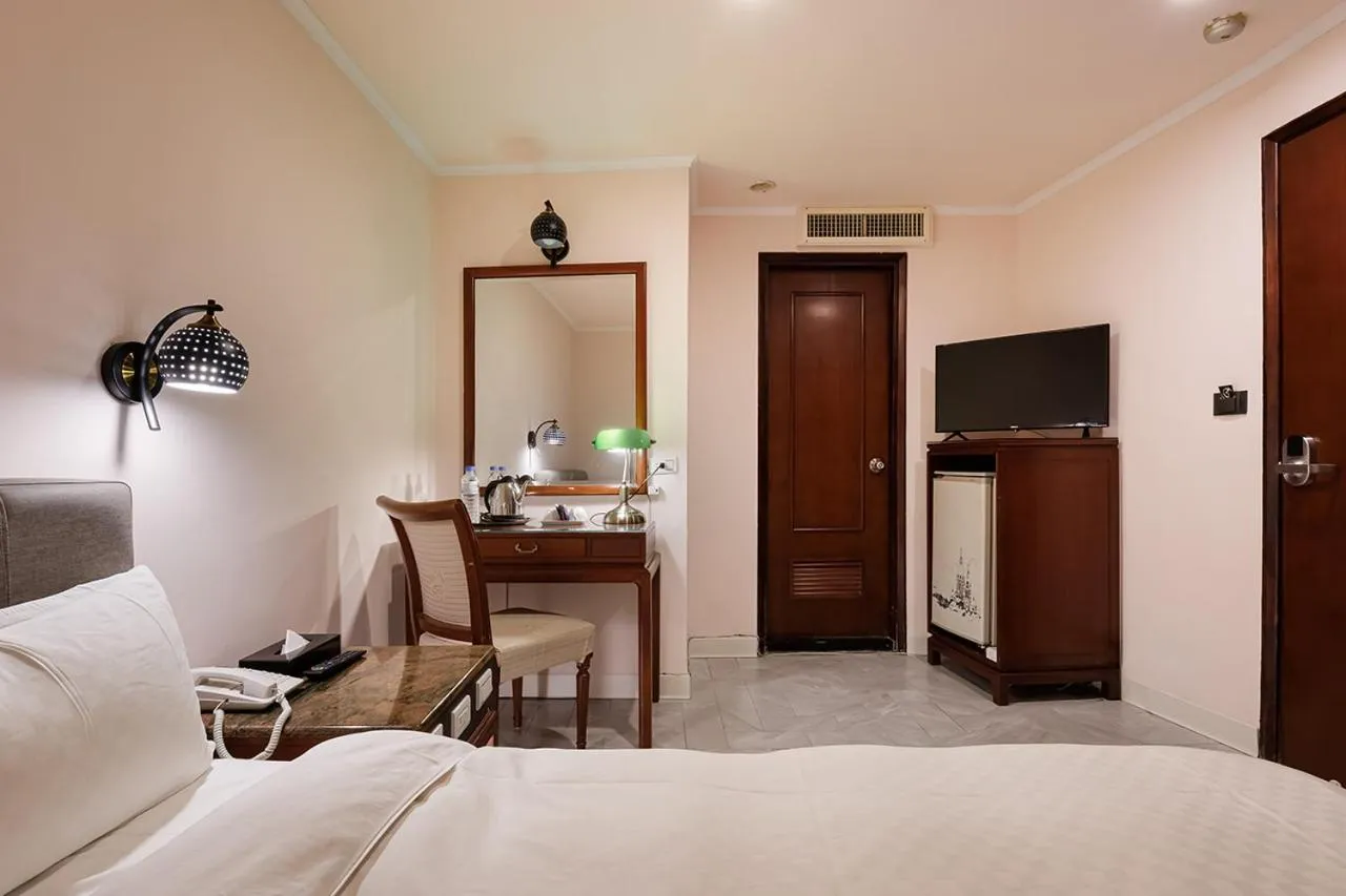 Bed in Moonlight Hotel