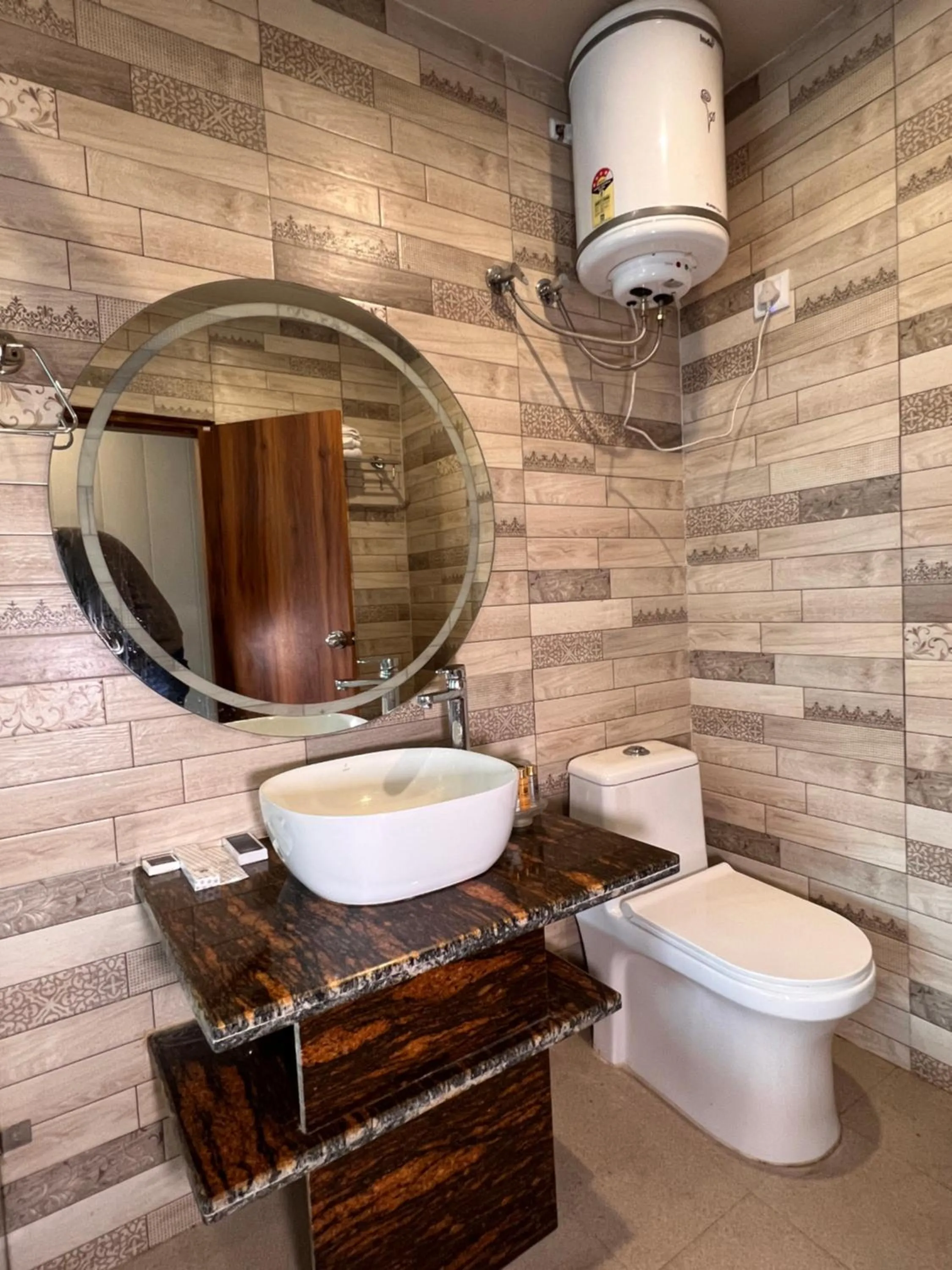 Toilet in Yogved Hospitality & Resort