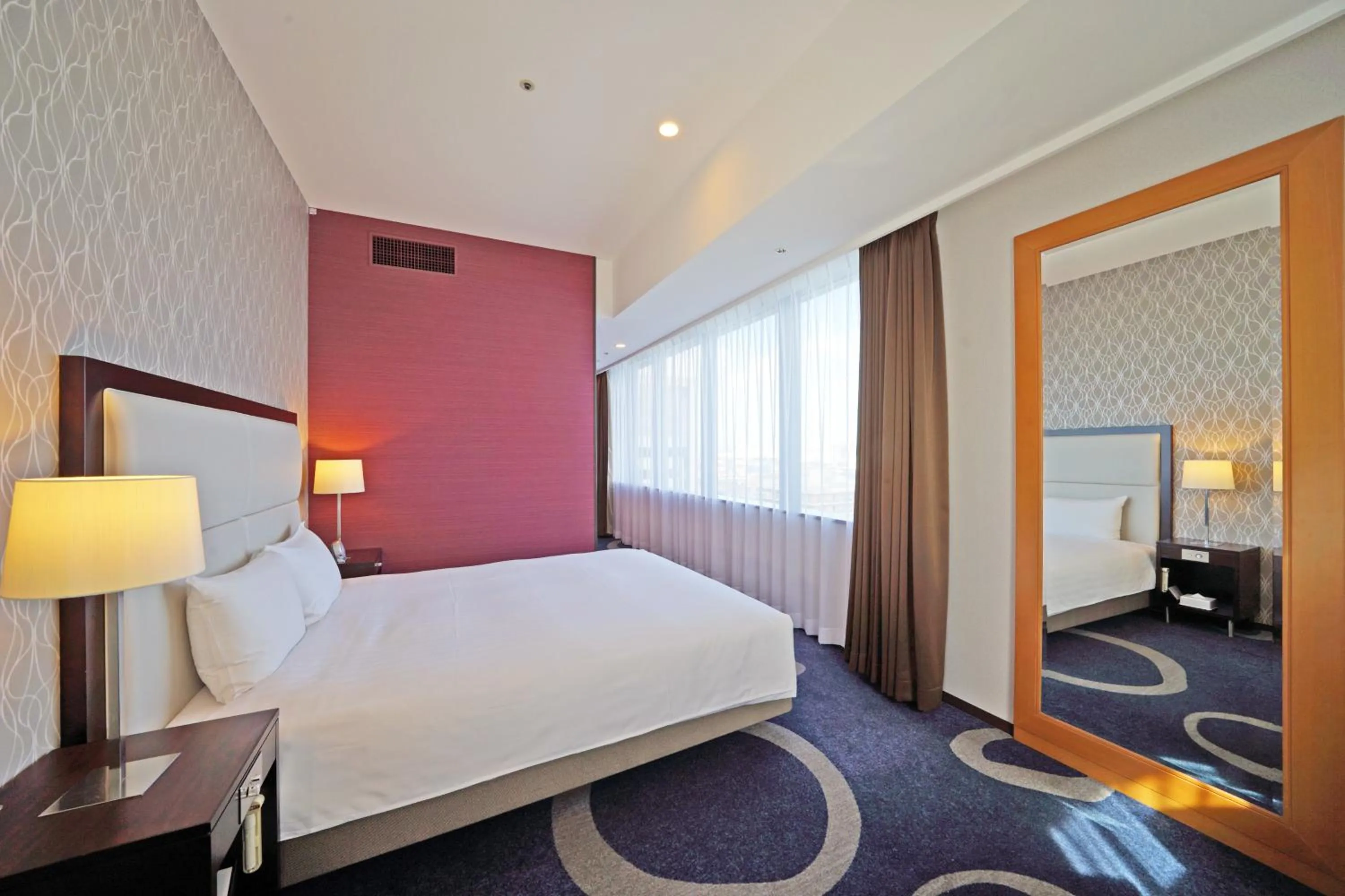 Bed in LOISIR HOTEL SHINAGAWA SEASIDE