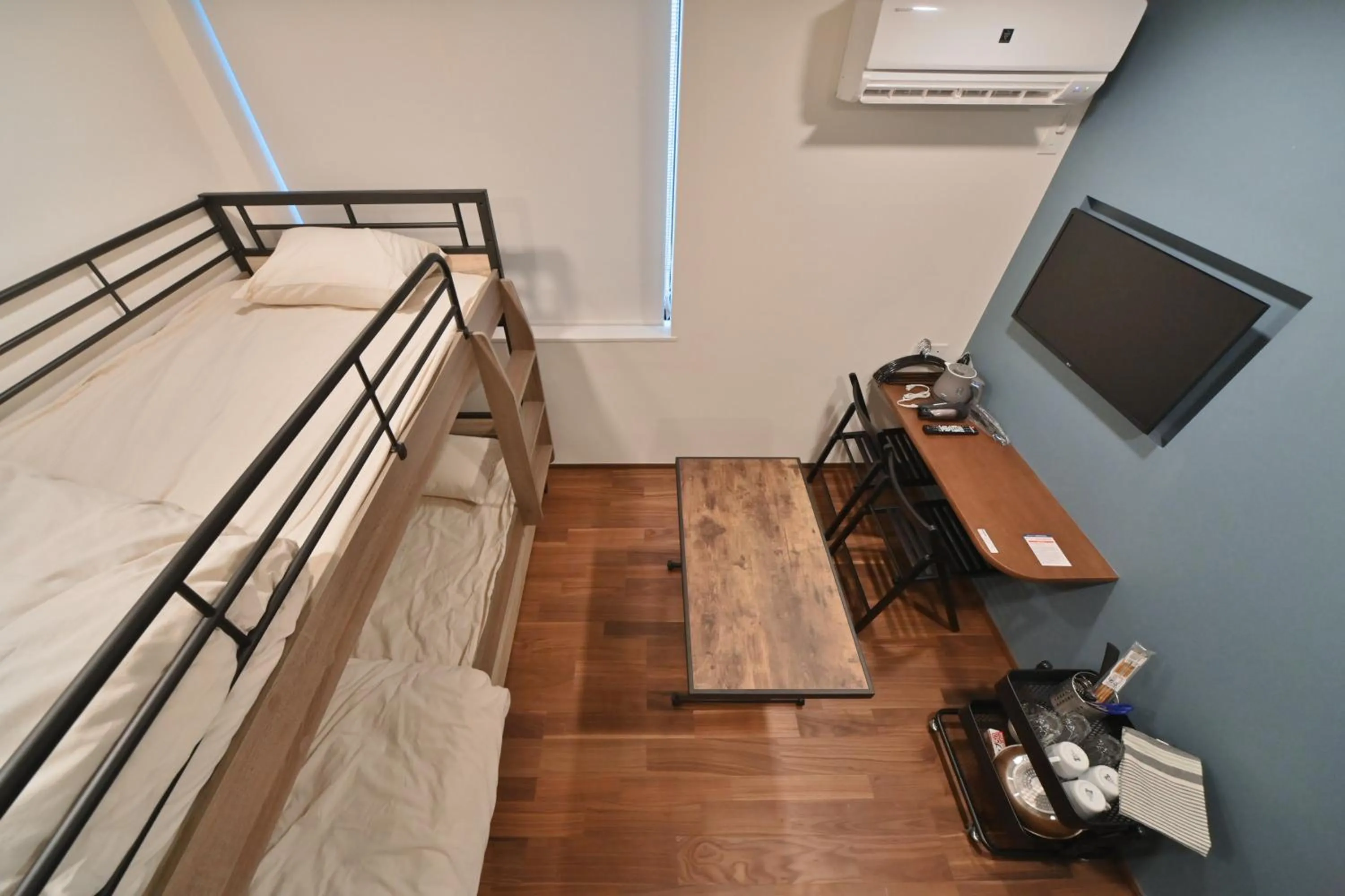 Bed in Stylewood Nishi-Shinjuku by Tranova