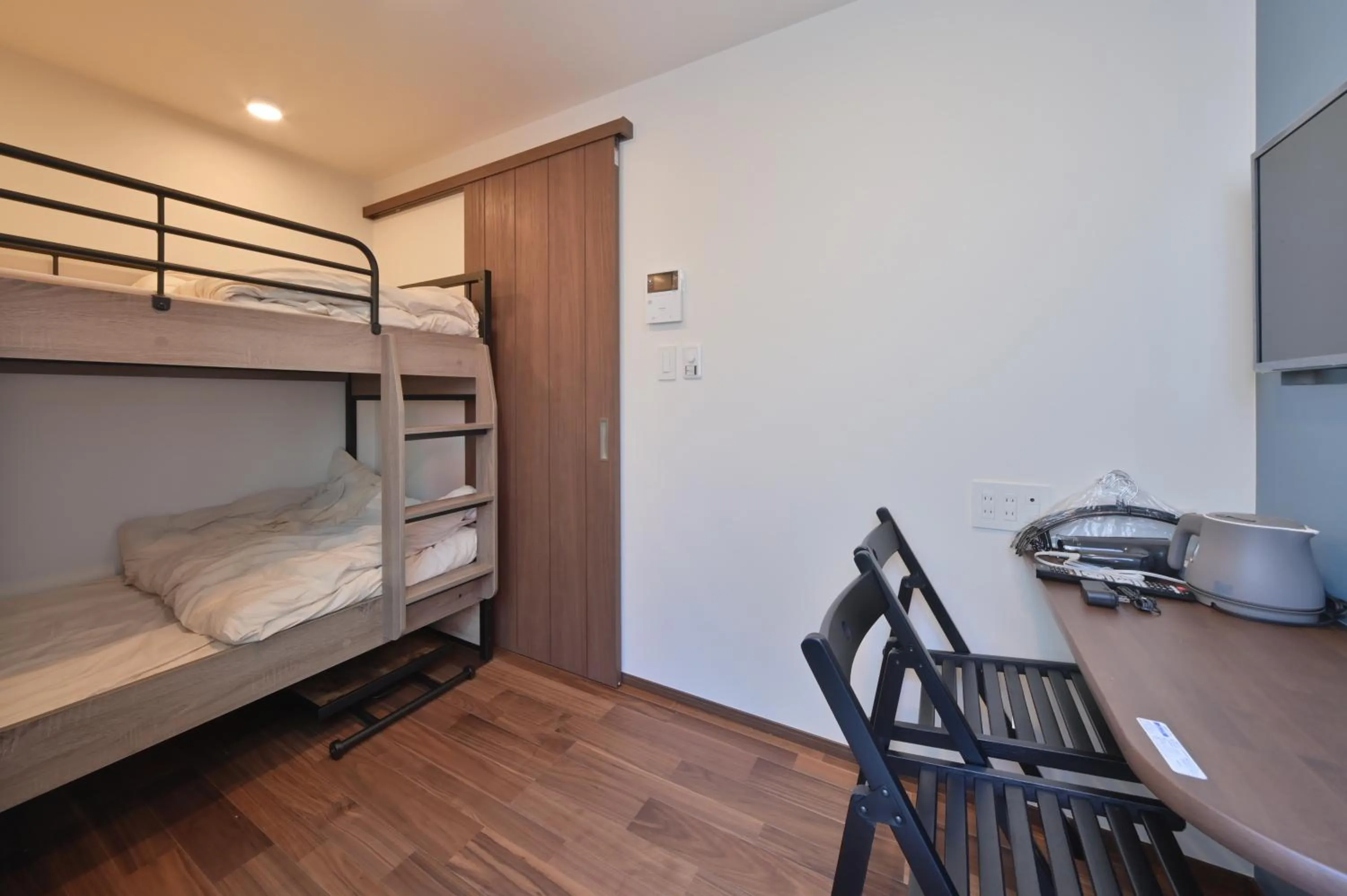 Bed in Stylewood Nishi-Shinjuku by Tranova