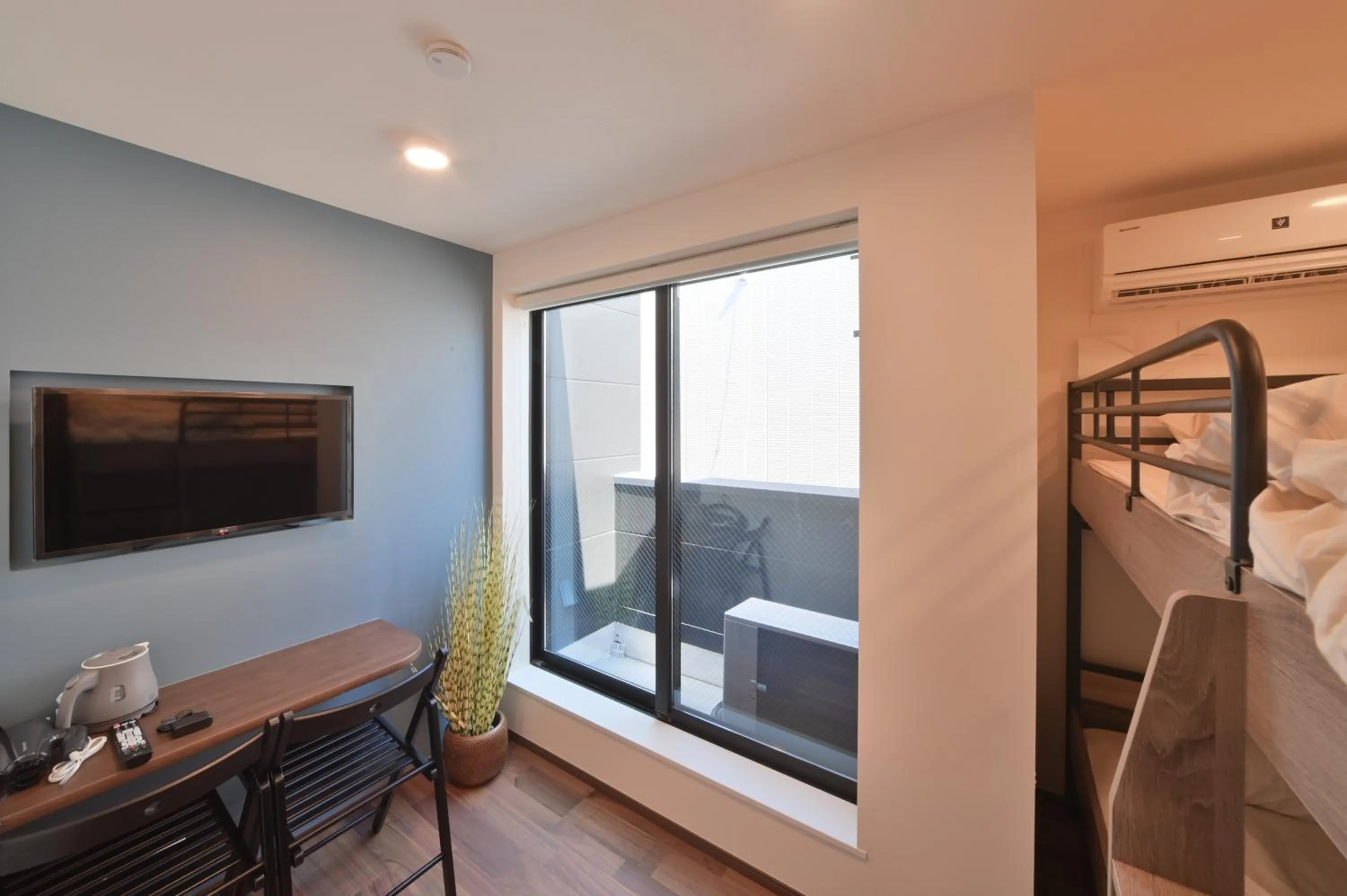 Bed in Stylewood Nishi-Shinjuku by Tranova