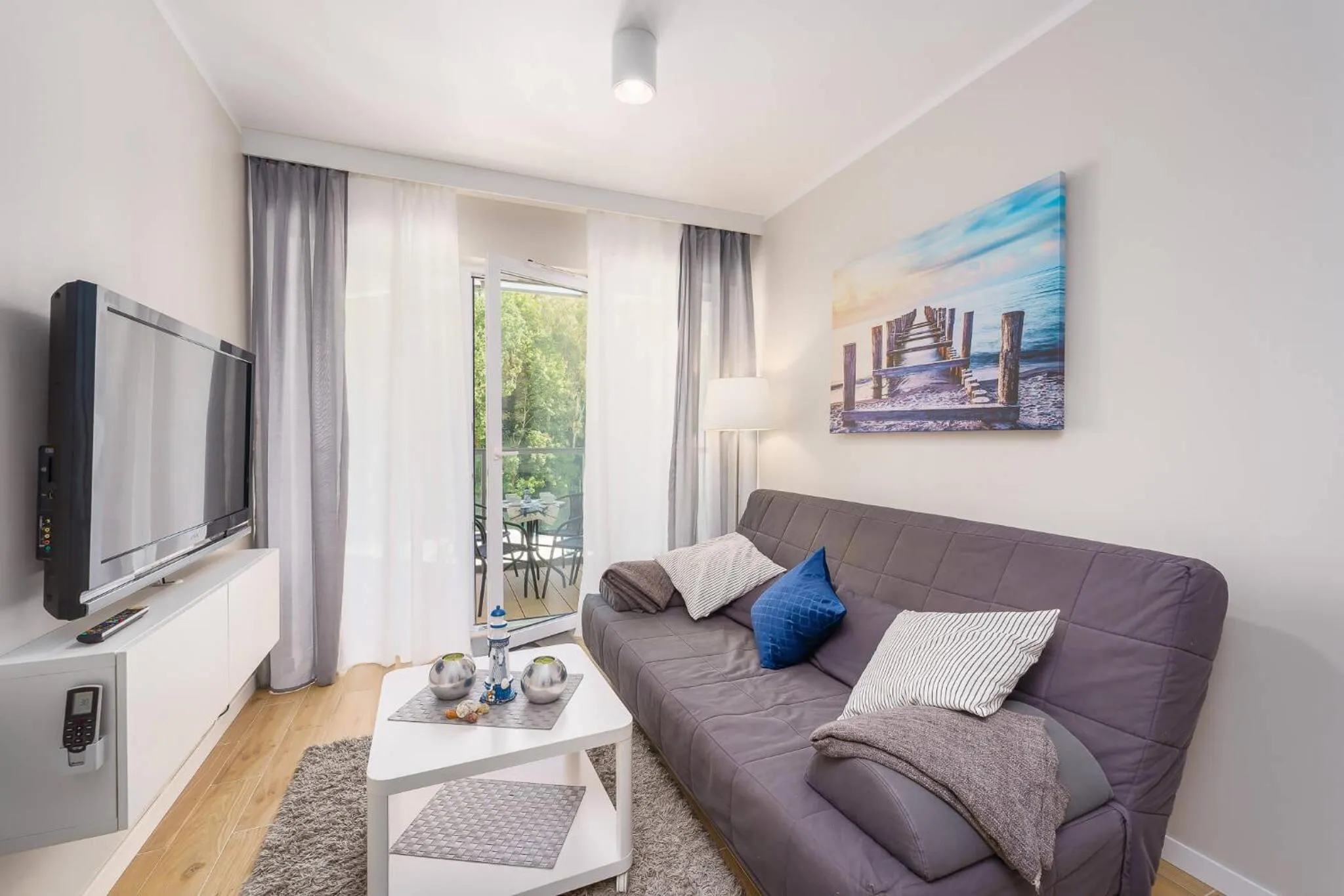 Communal lounge/ TV room in Ustronie Apartments 20 m do plaży