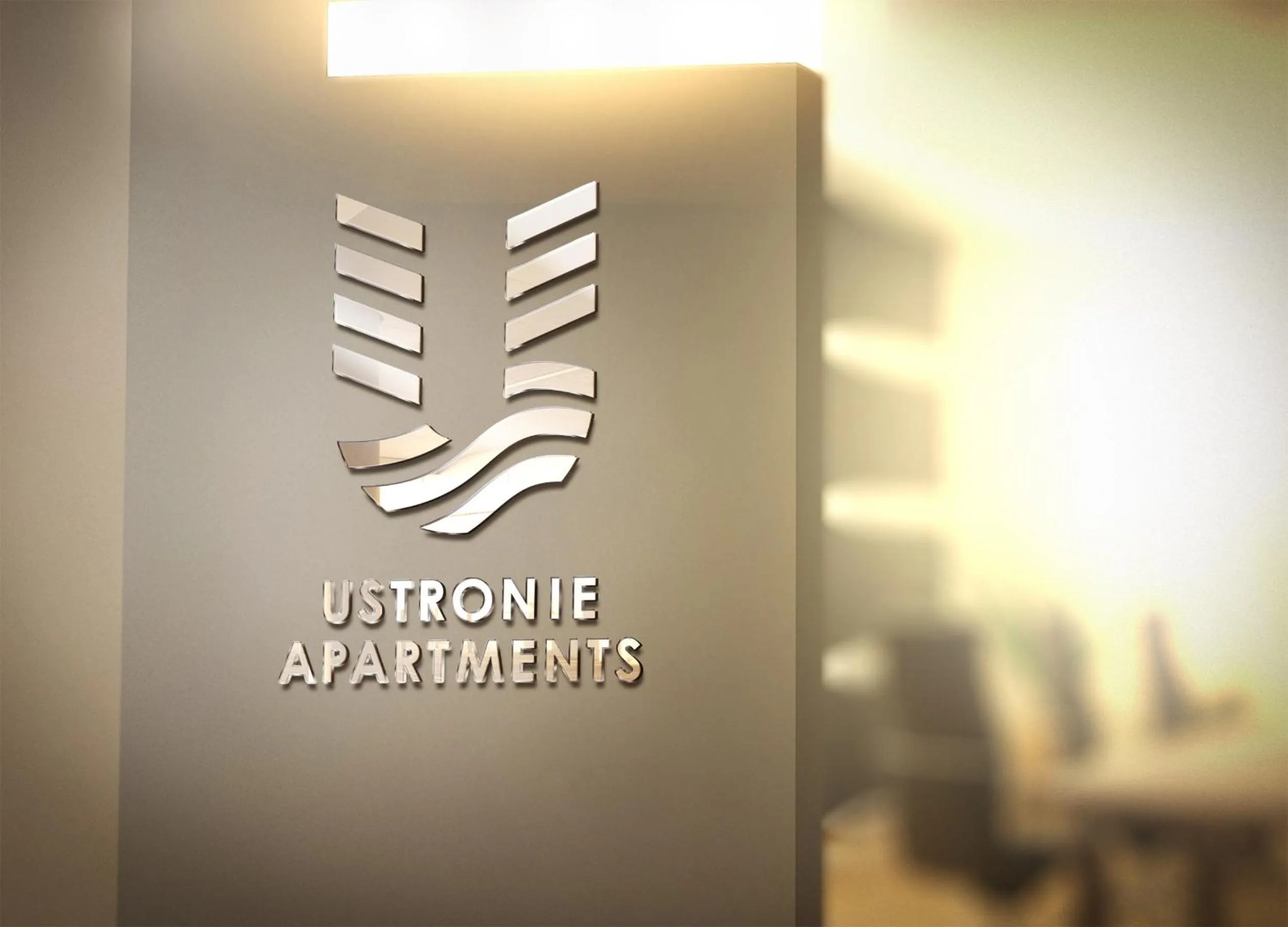 Property logo or sign in Ustronie Apartments 20 m do plaży