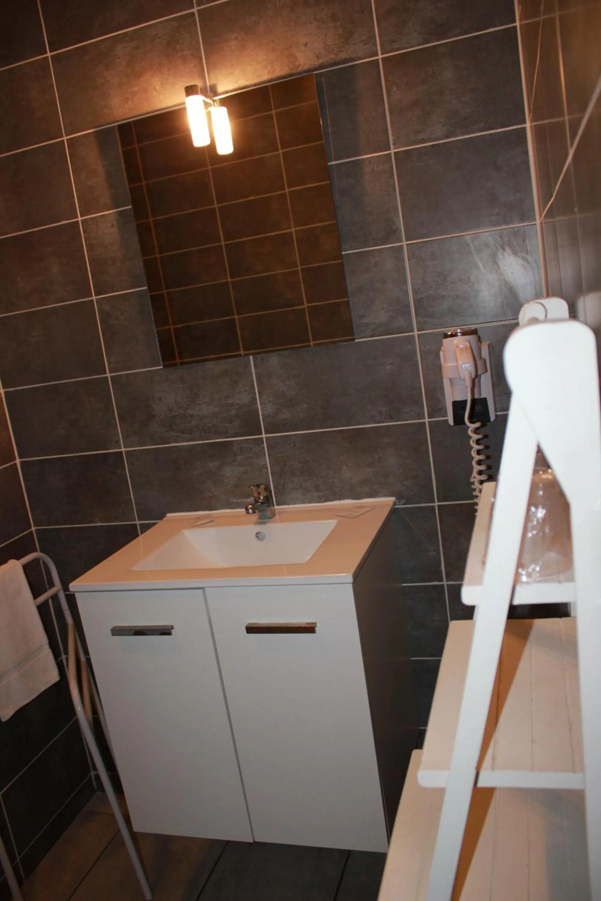 Bathroom in Hôtel de La Beauronne