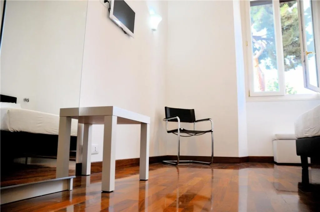 Bedroom in Feliz in Roma B&B