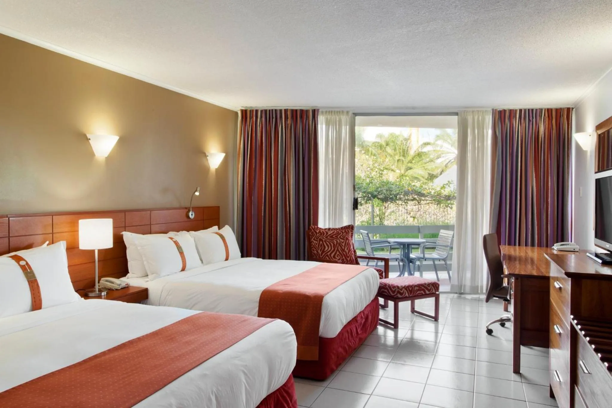 Photo of the whole room, Bed in Holiday Inn & Suites Port Moresby by IHG