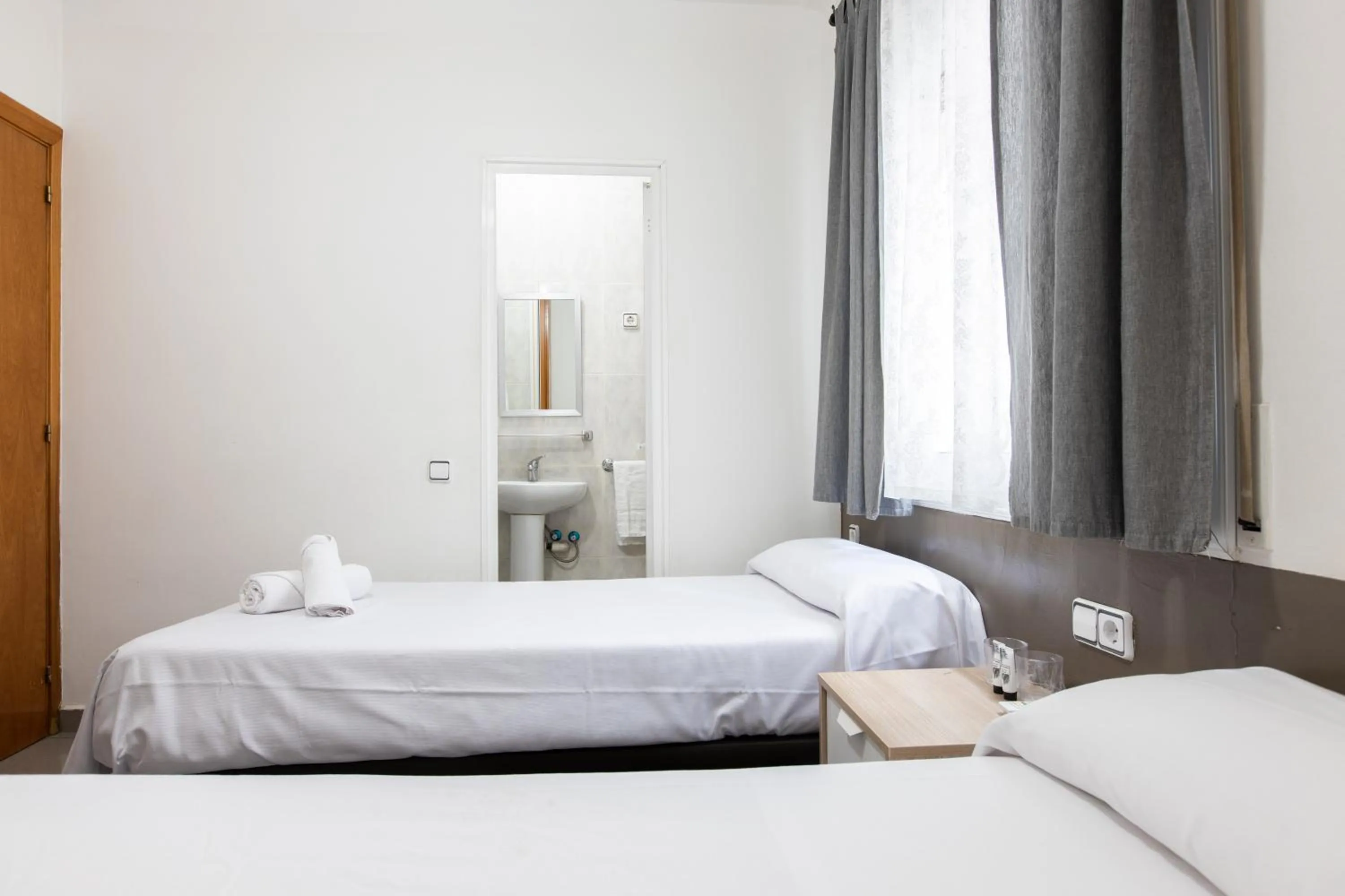 Bed in Pensión Galicia