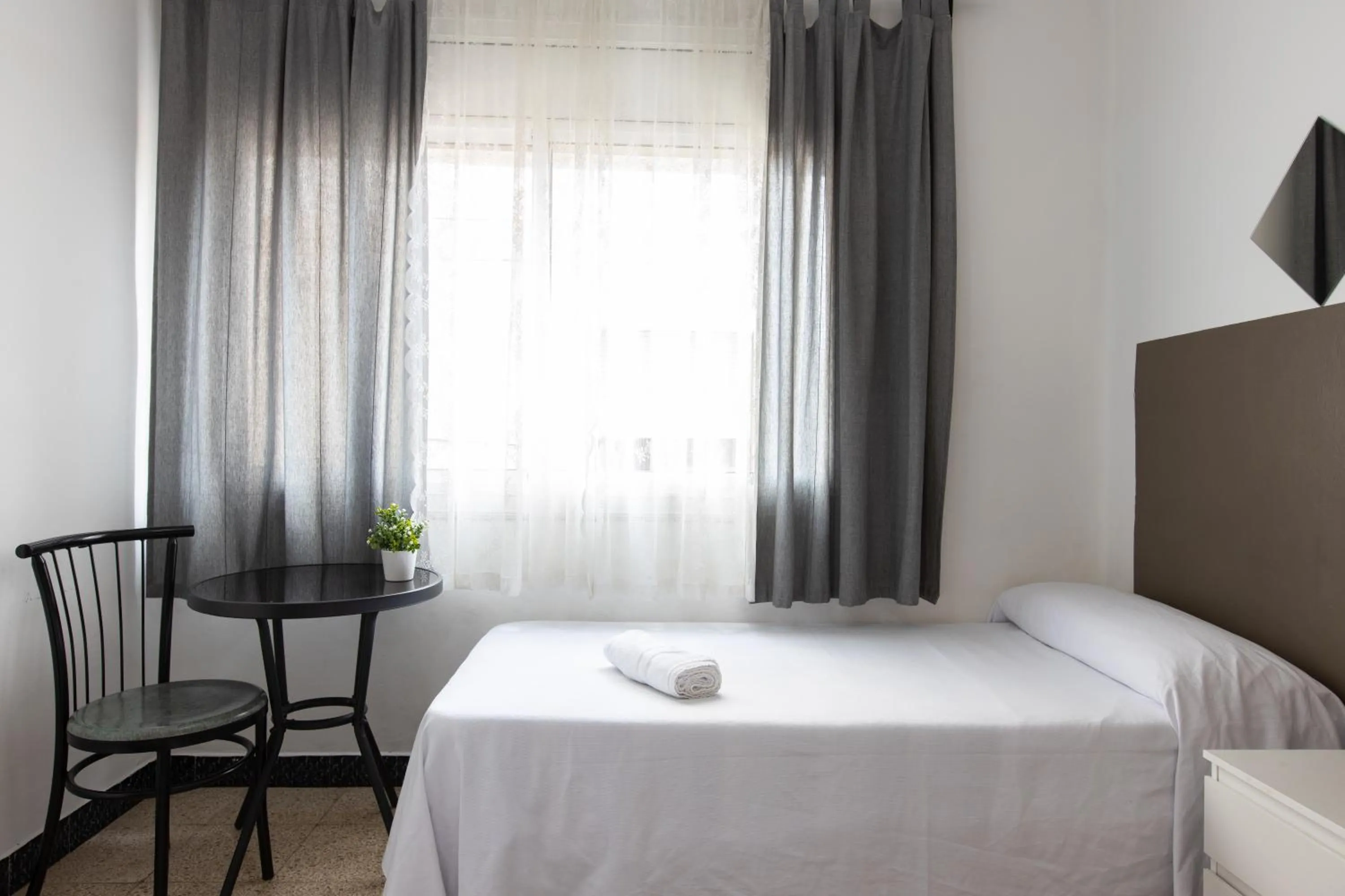 Bed in Pensión Galicia