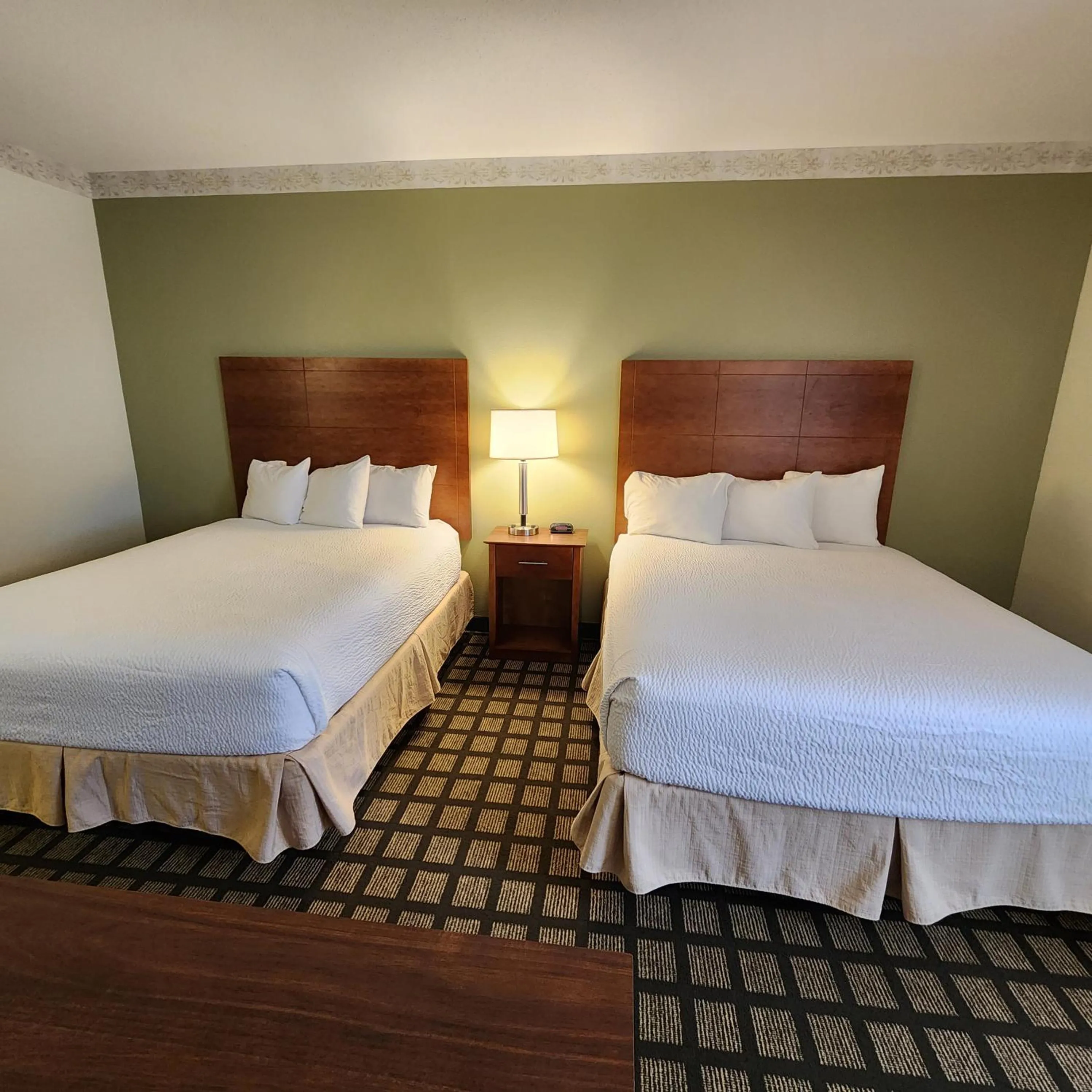 Bed in Baymont by Wyndham Mackinaw City