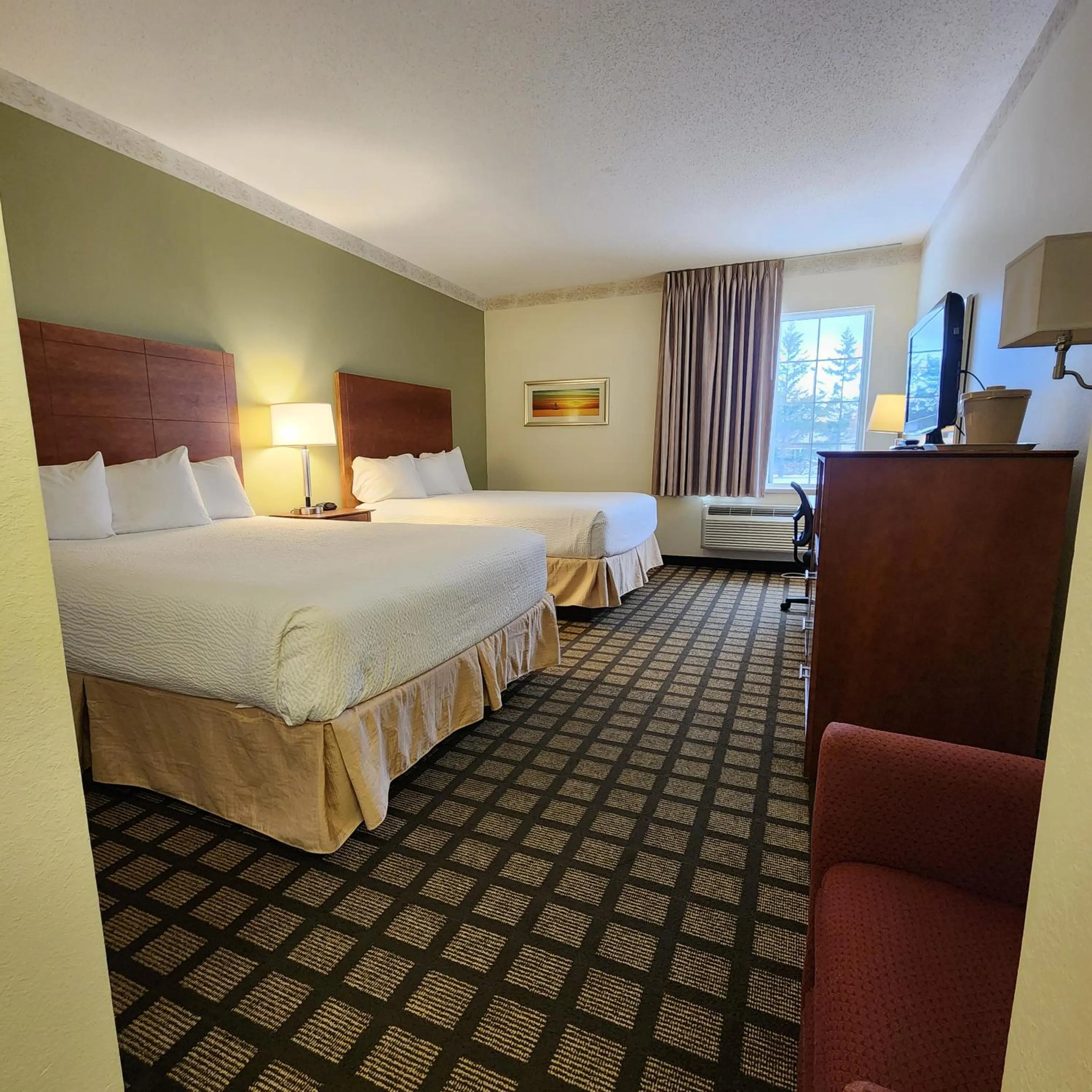 Photo of the whole room, Bed in Baymont by Wyndham Mackinaw City