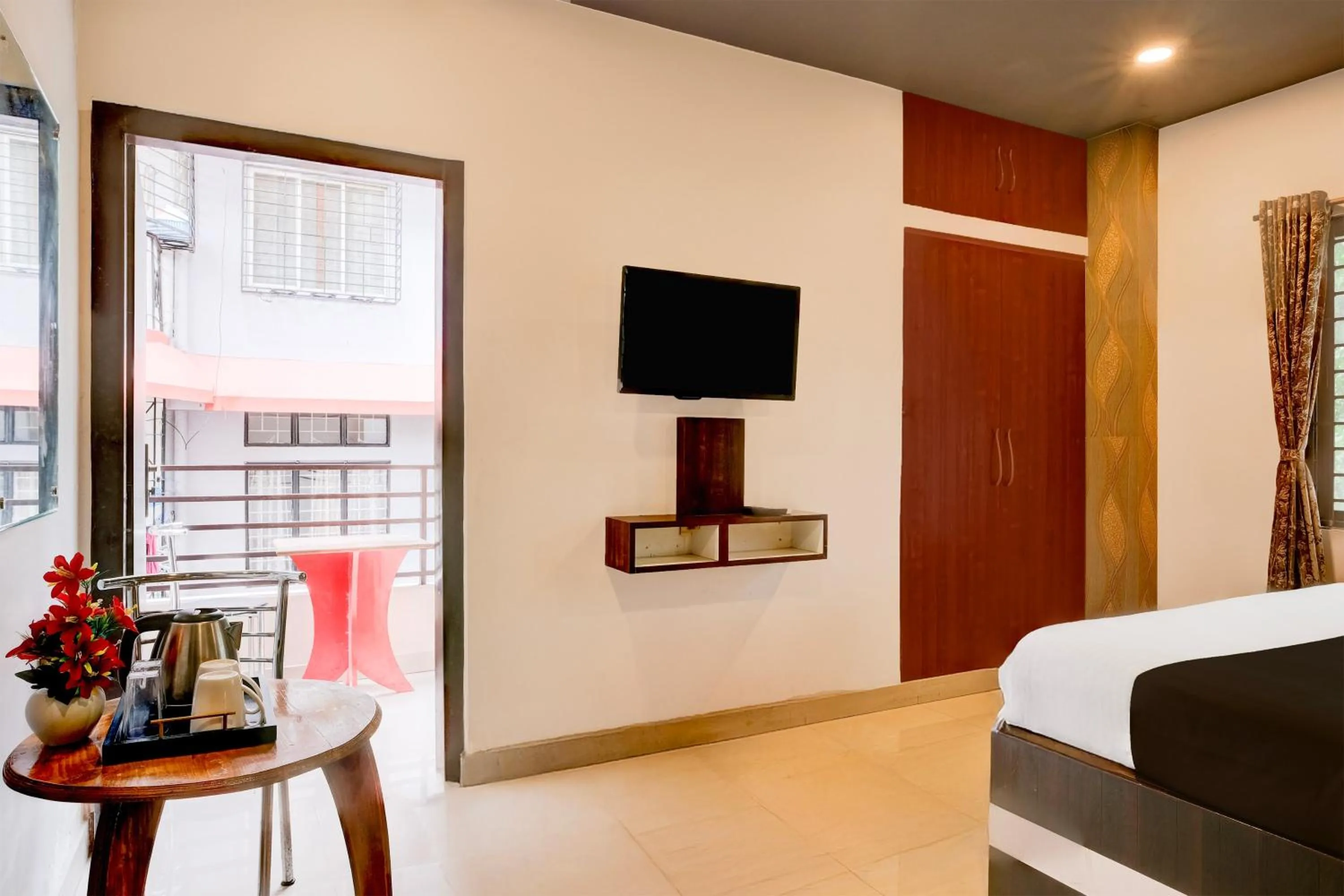 Bedroom, Bed in Super Townhouse Beltola Tiniali Formerly Hotel Pratishtha