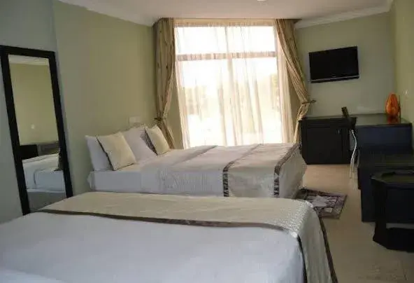 Living room, Bed in Panone Hotel-Chekereni Living room, Bed in Panone Hotel-Chekereni