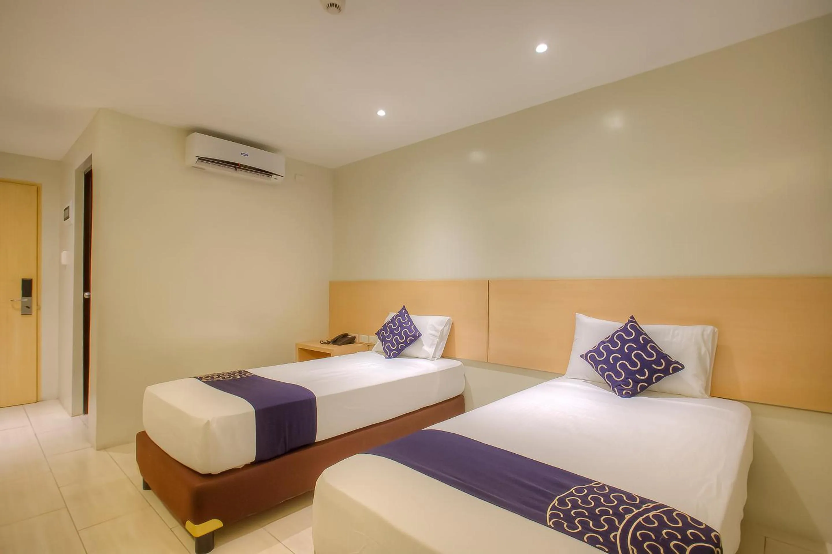 Bedroom, Bed in Capital O 827 Speciale Hotel