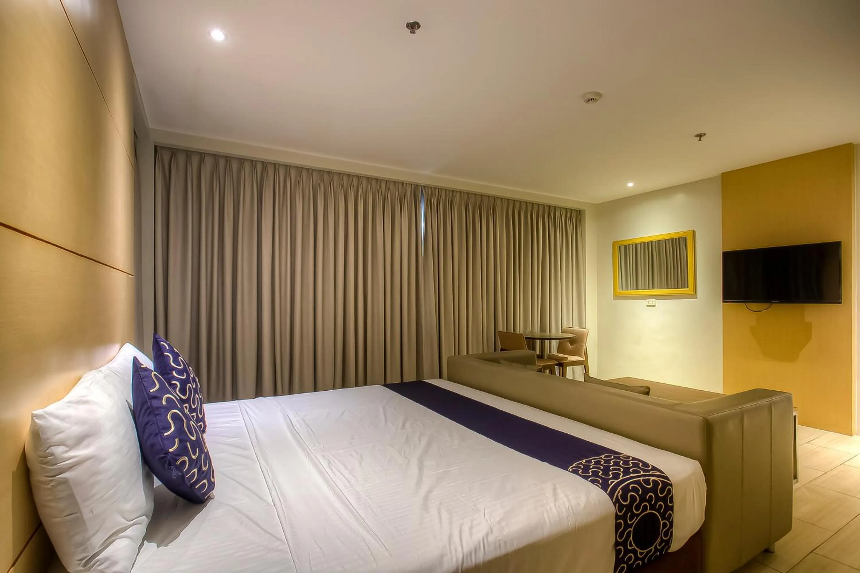 Bedroom, Bed in Capital O 827 Speciale Hotel