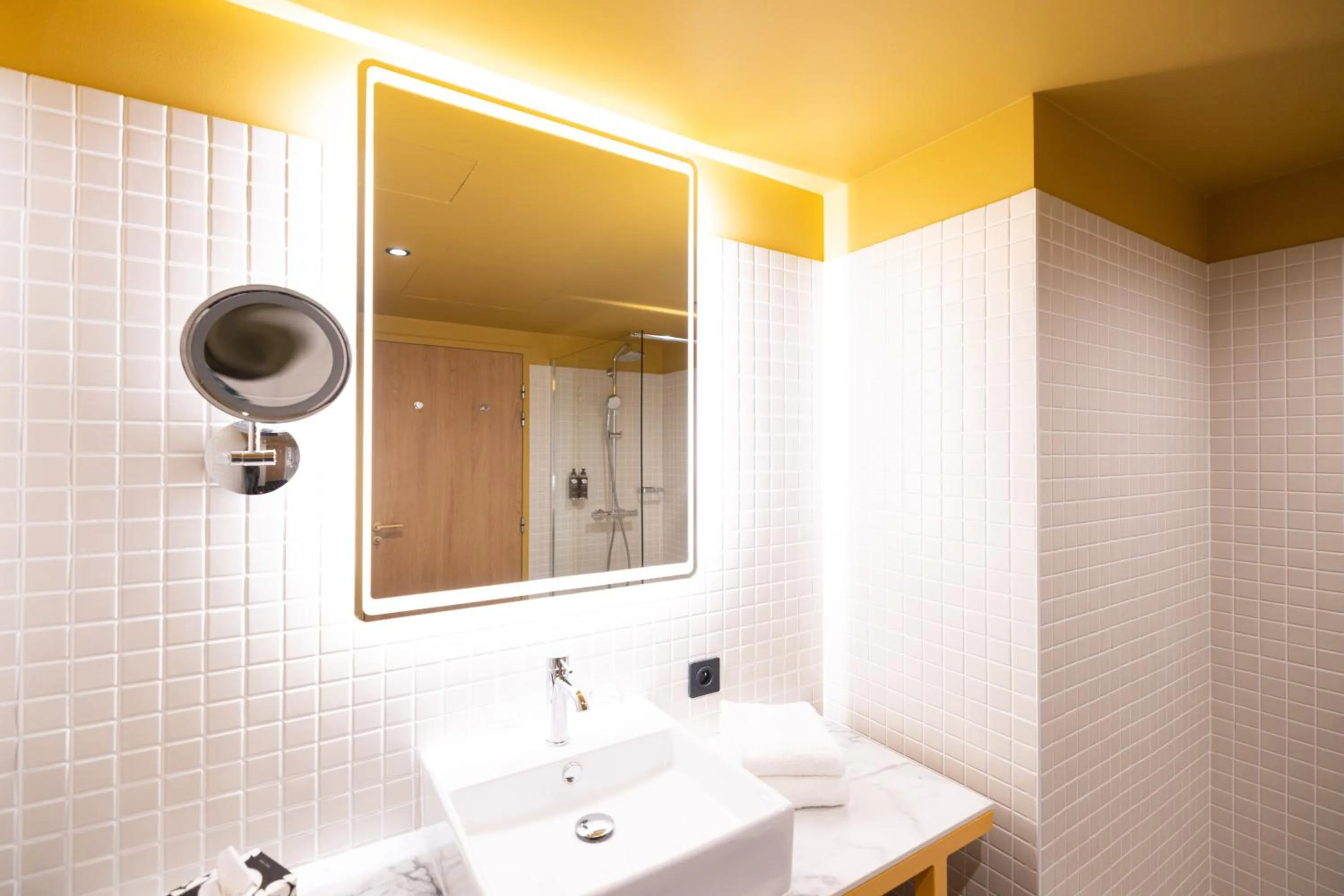Bathroom in KOPSTER Hotel Residence Paris Ouest Colombes