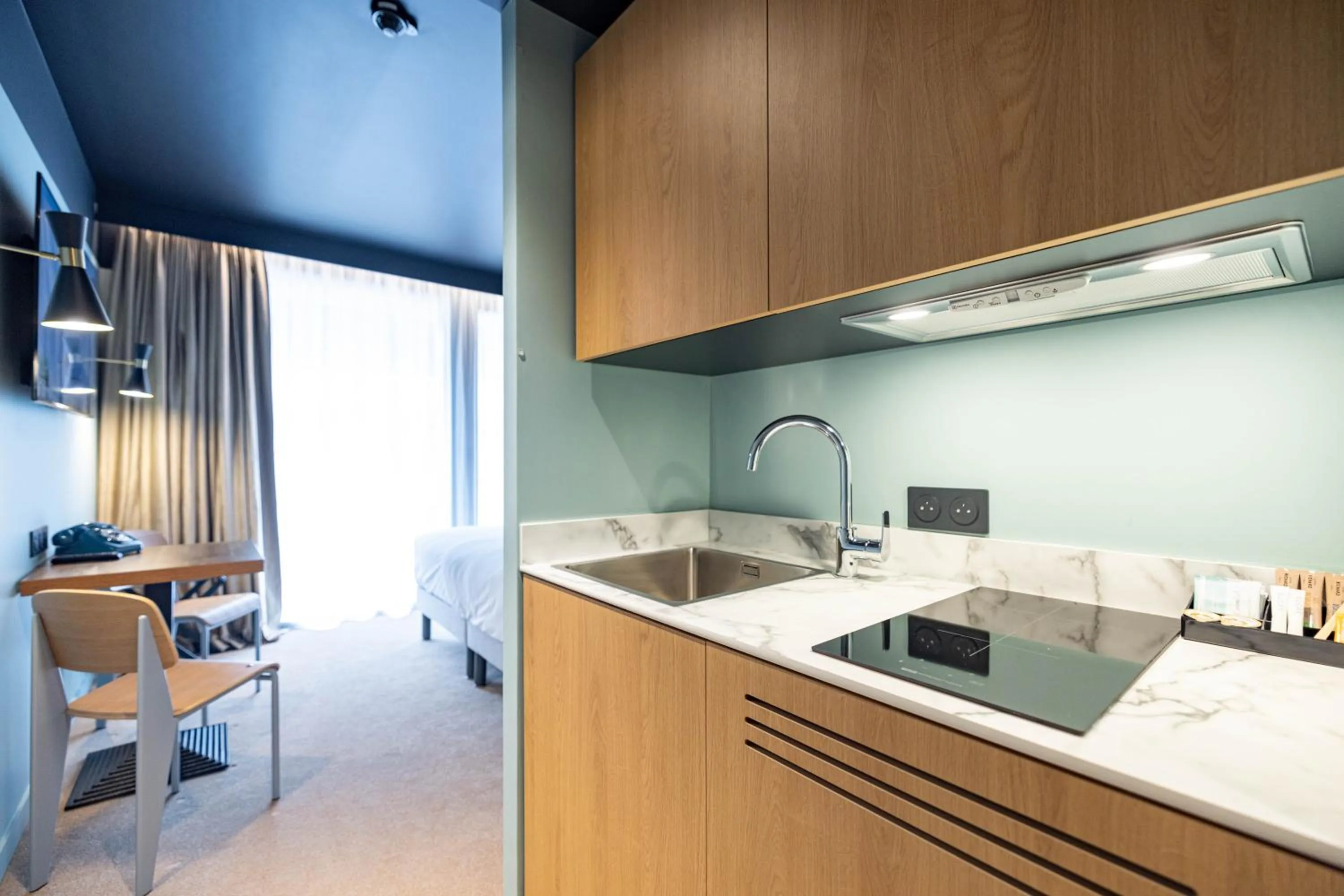 Kitchen or kitchenette in KOPSTER Hotel Residence Paris Ouest Colombes