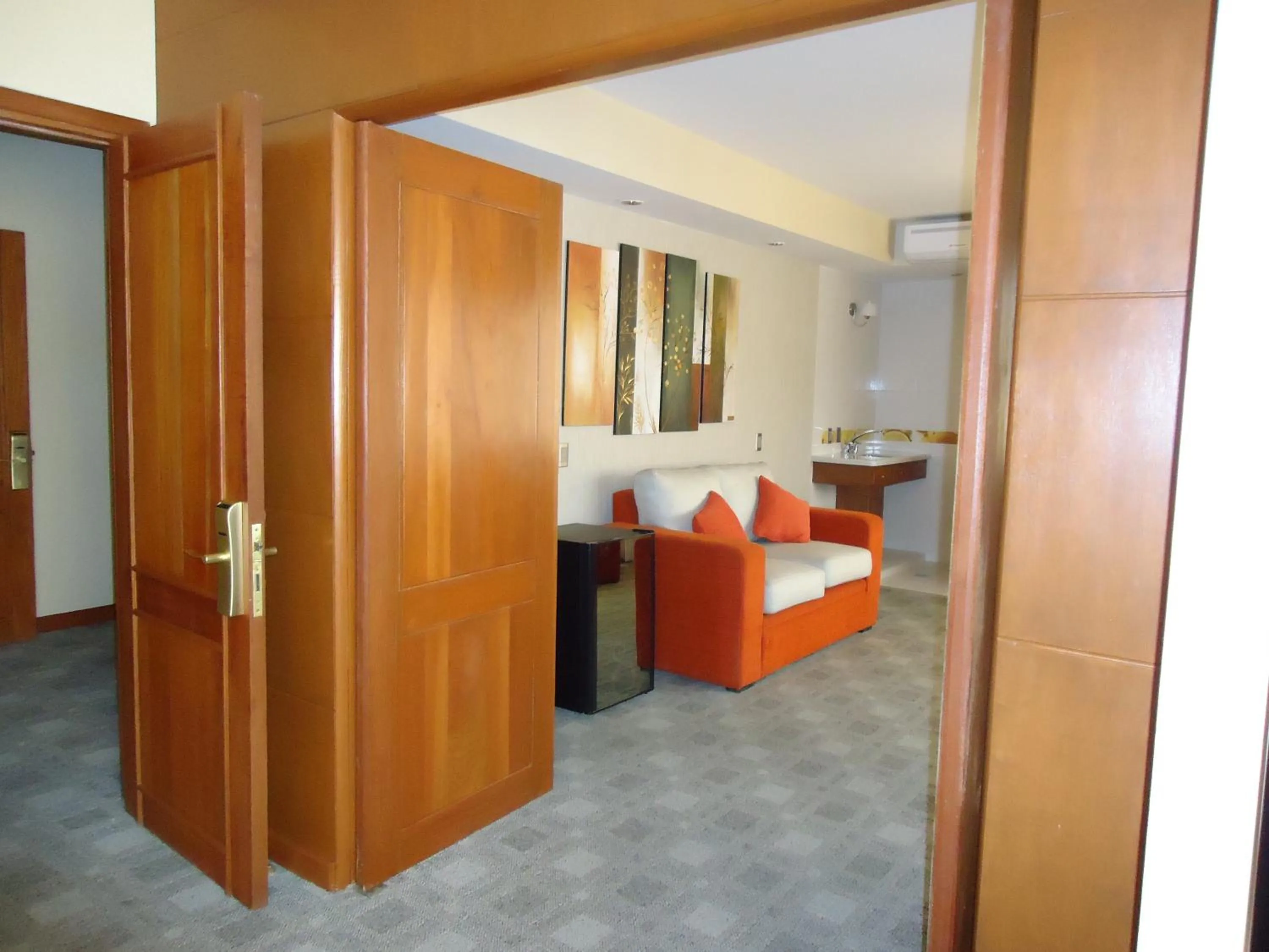 Living room, Bed in Gran Hotel Toloma