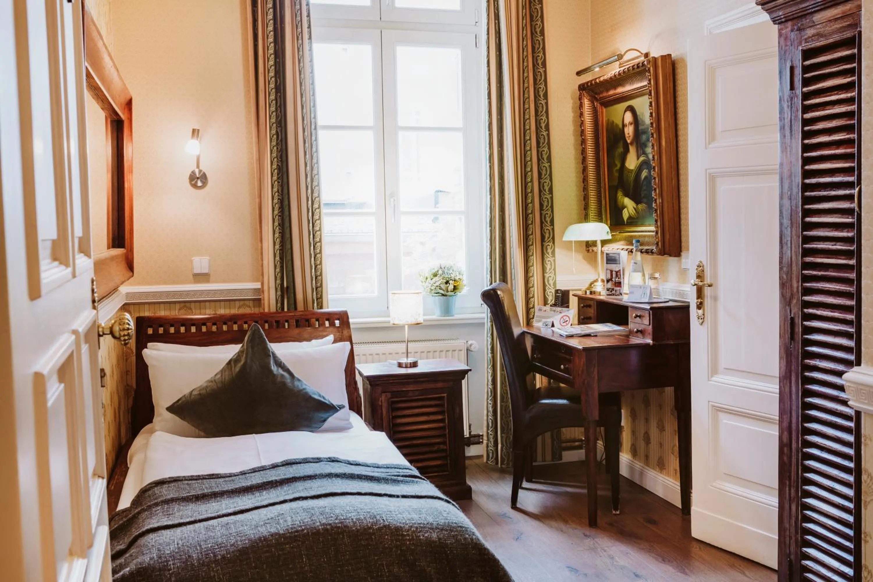 Photo of the whole room, Bed in Honigmond Boutique Hotel