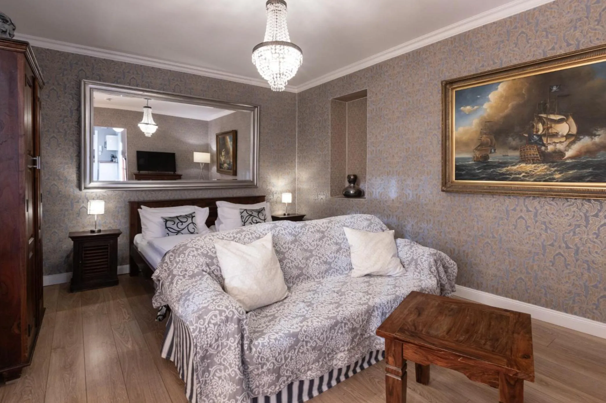 Bed in THE GATE GARDEN Hotel