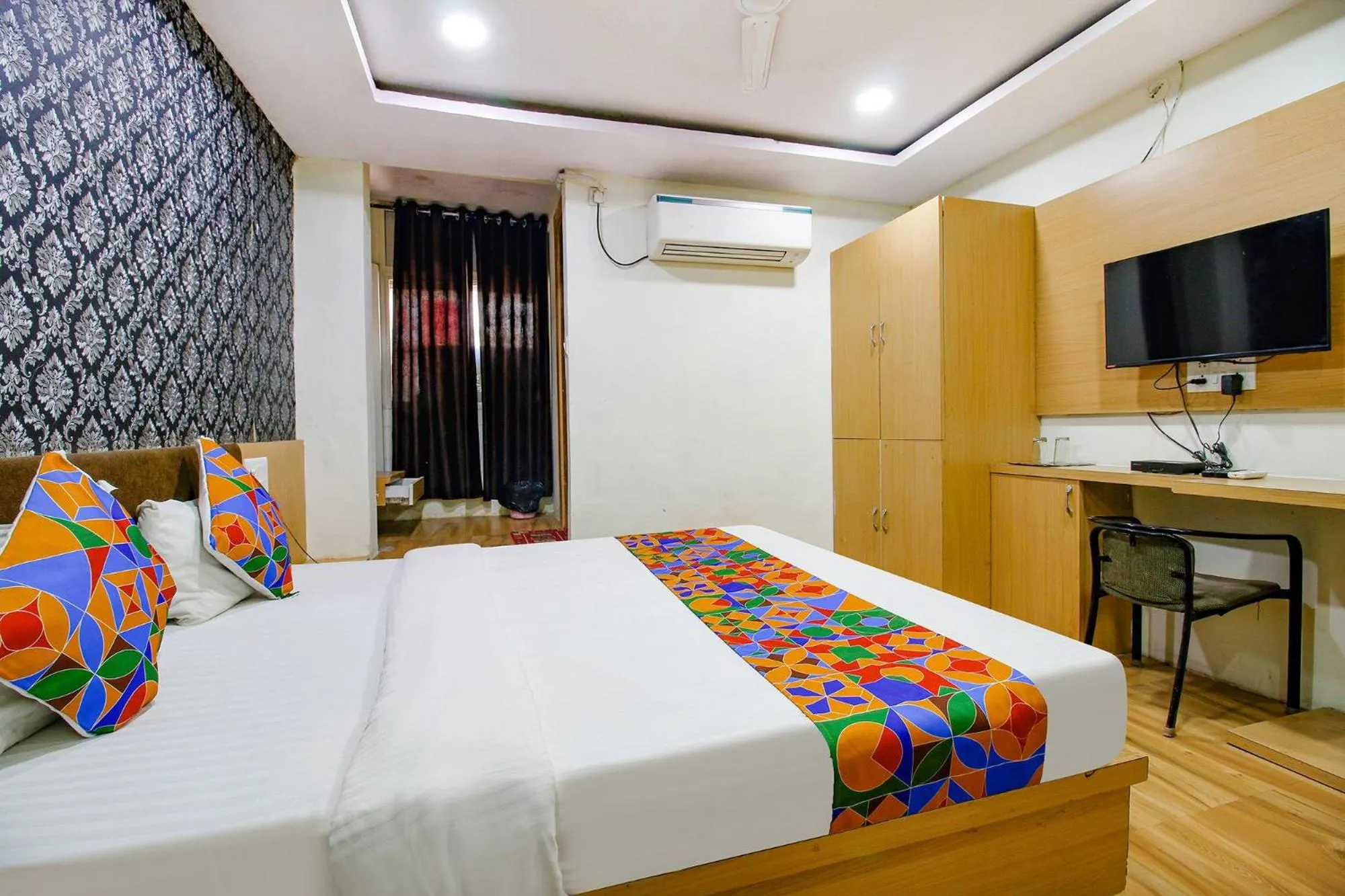 Bed in FabHotel Surbhi