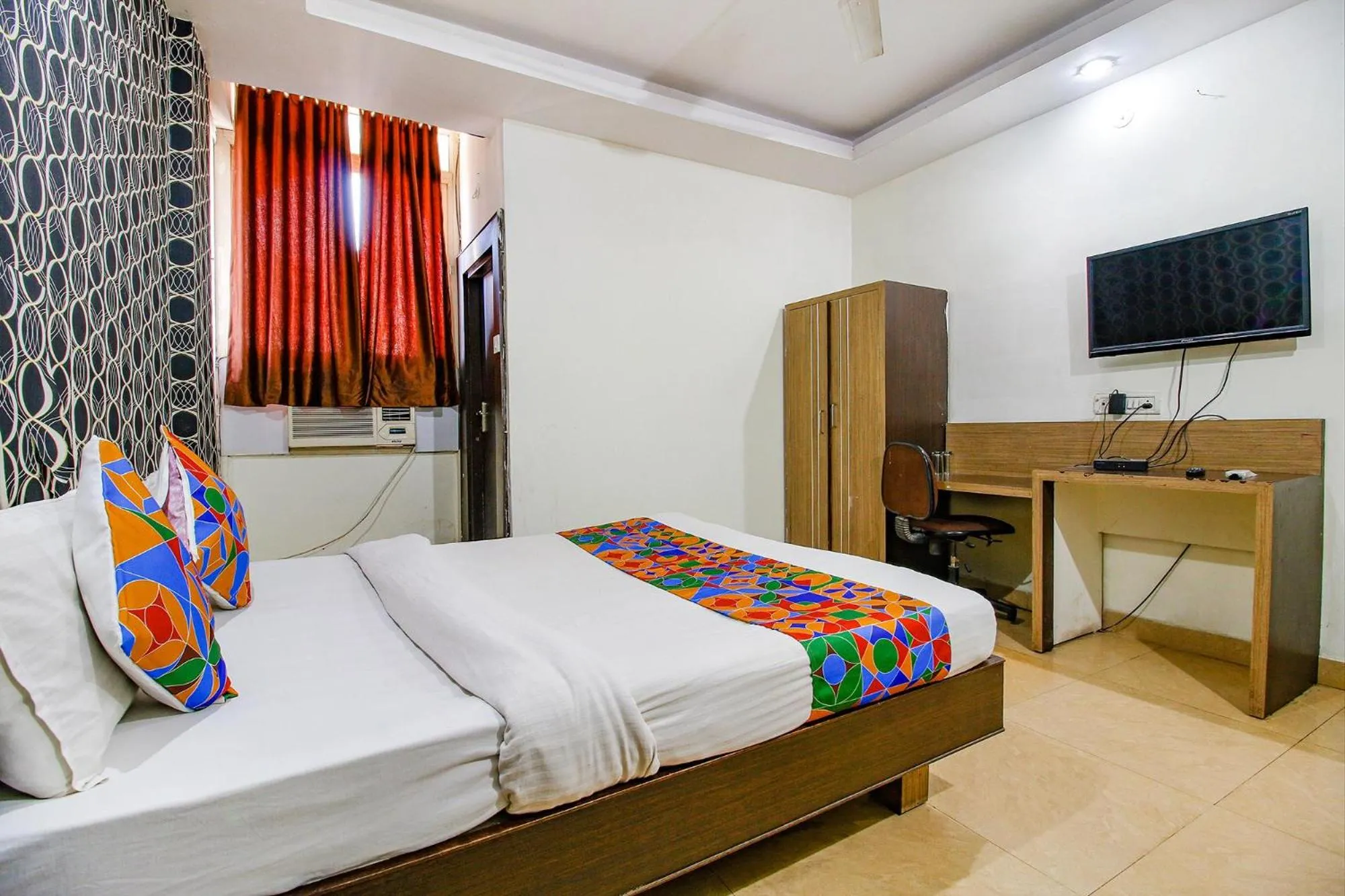 Bed in FabHotel Surbhi