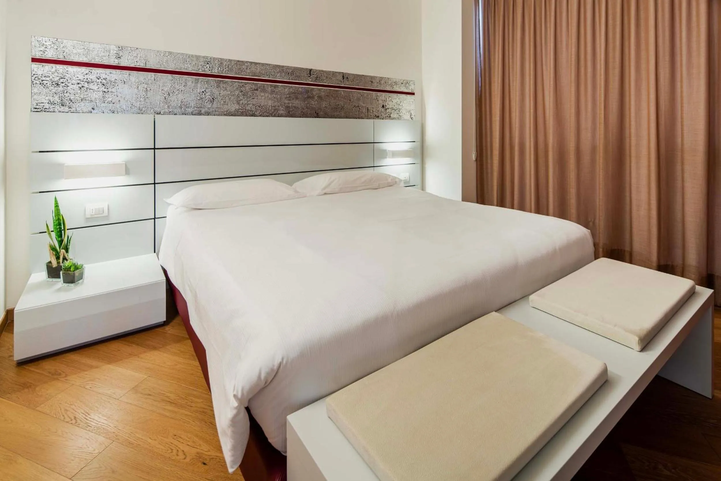 Bed in Portus Appartamenti