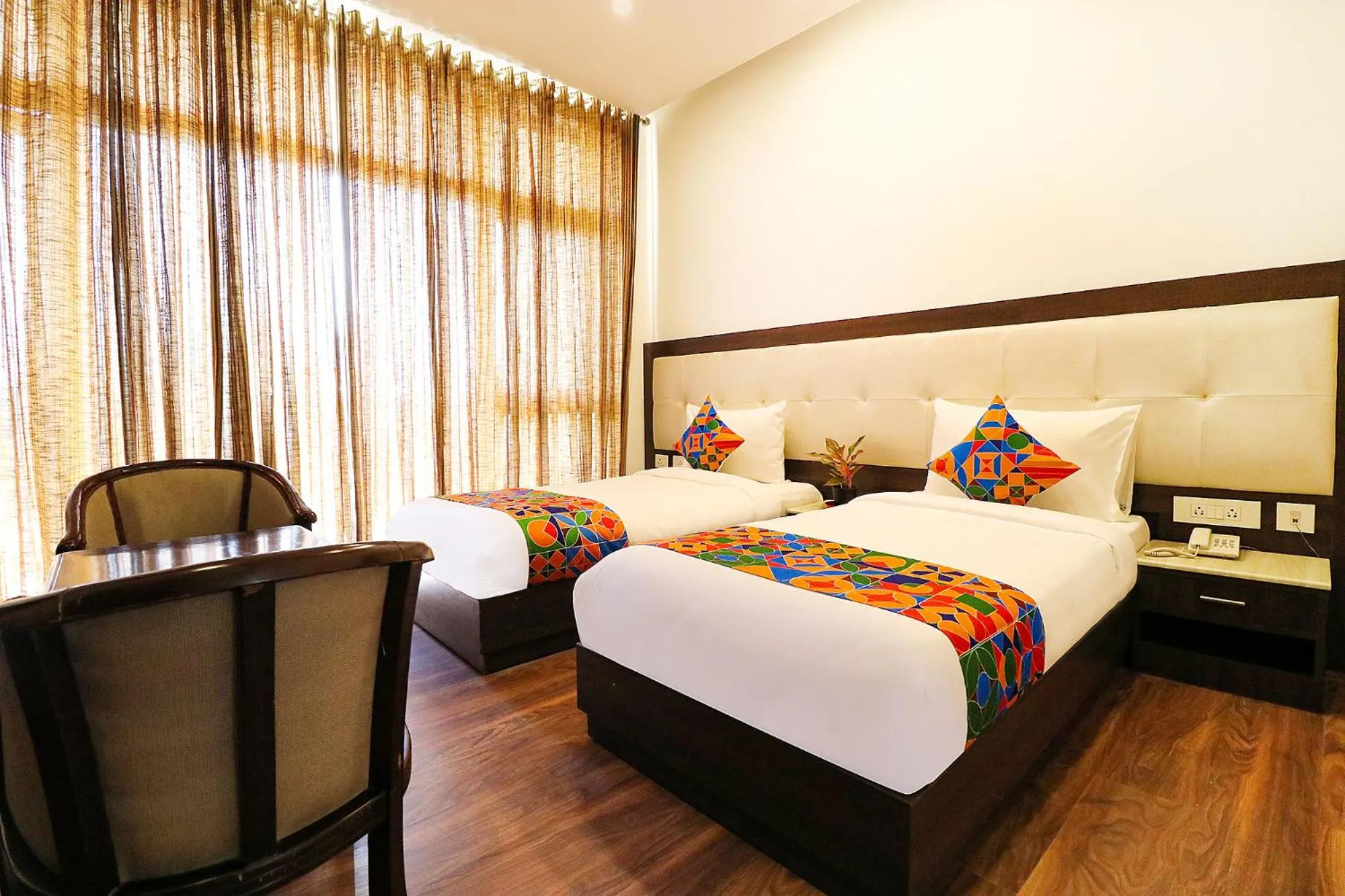 Bed in FabHotel Oyster Villa