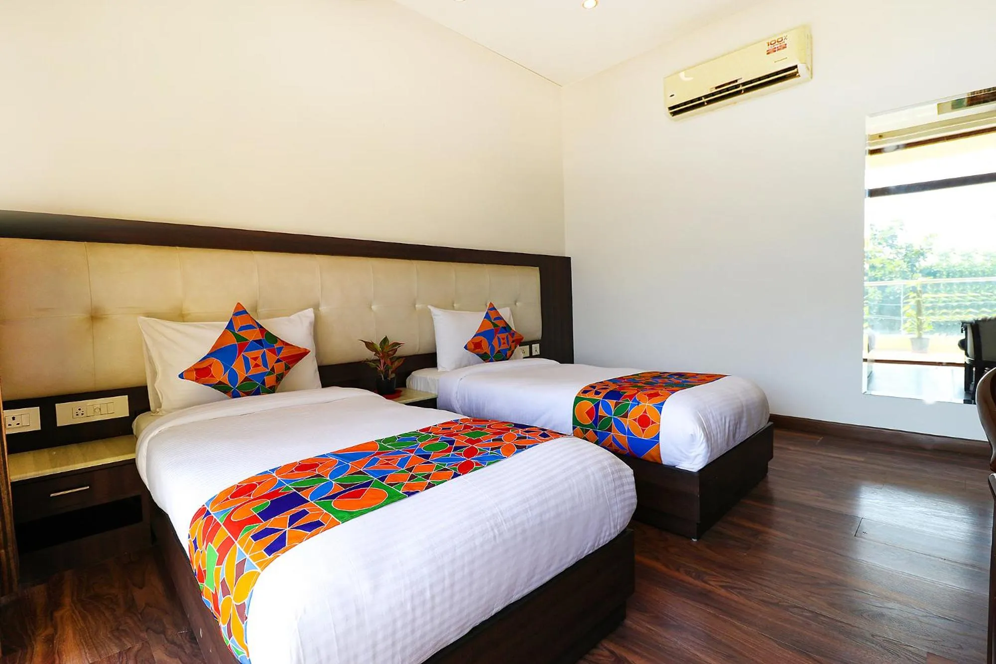 Bed in FabHotel Oyster Villa