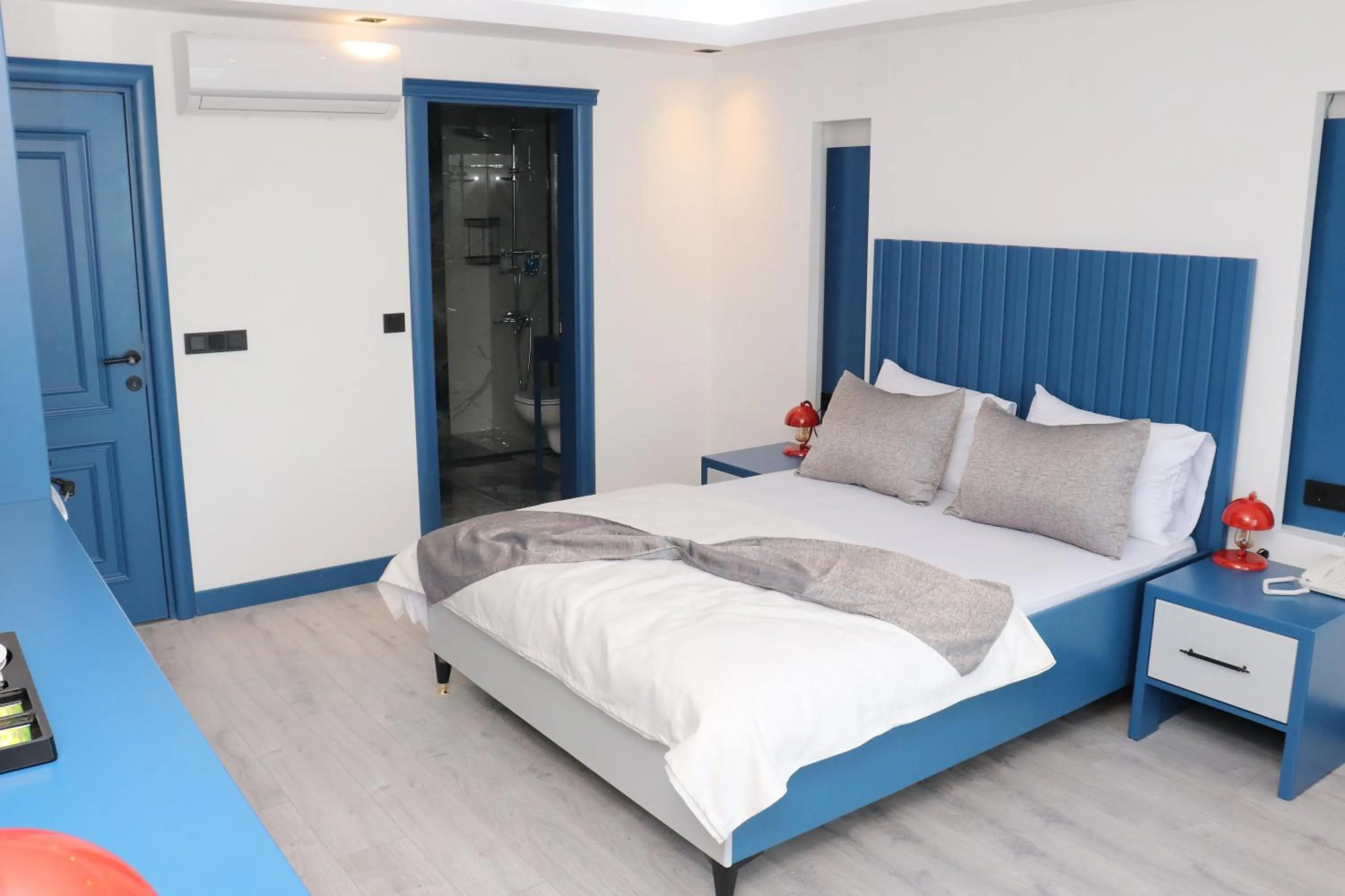 Bed in Blue Ay Boutique Hotel