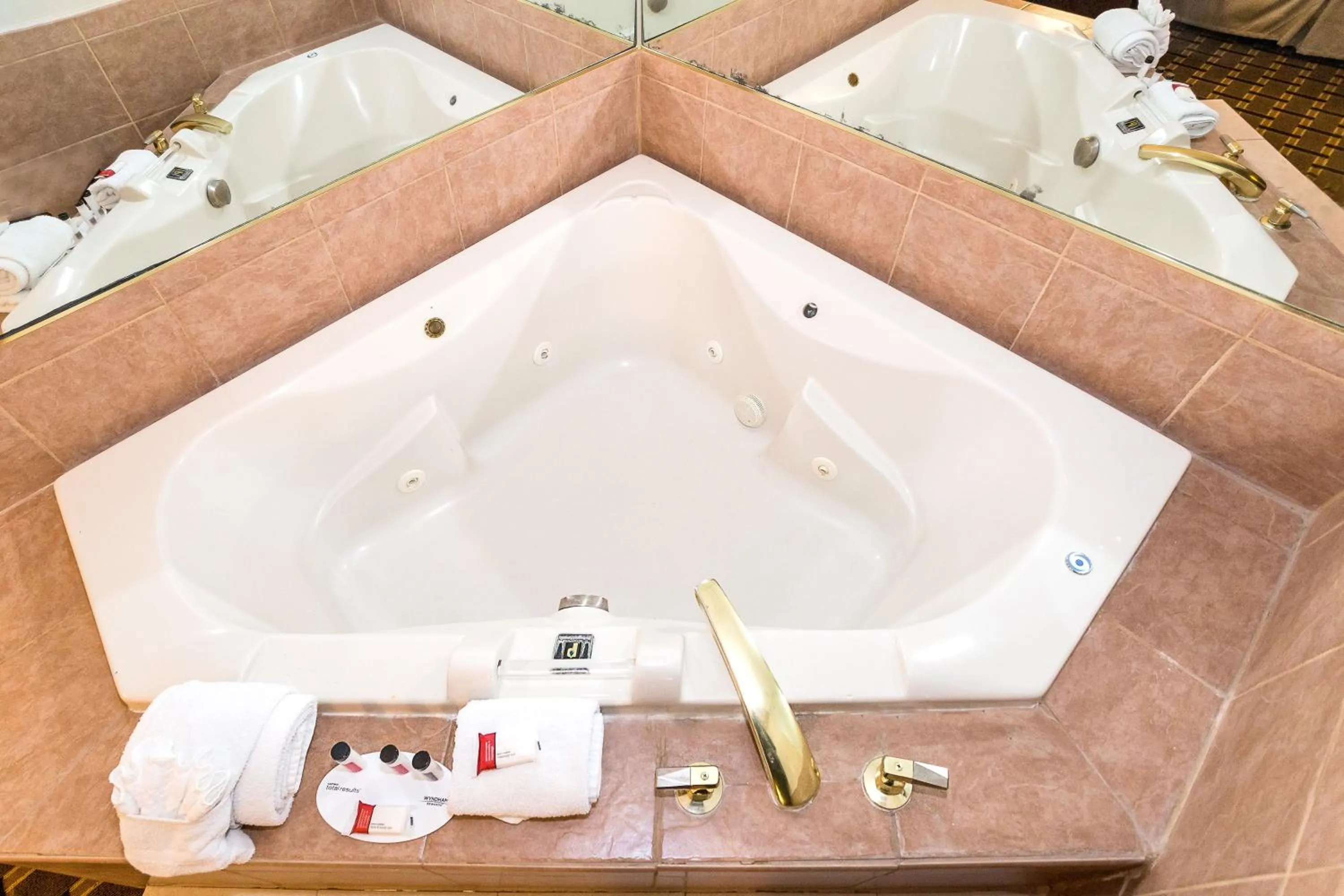 Bathroom in Ramada by Wyndham Plymouth Hotel & Conference Center