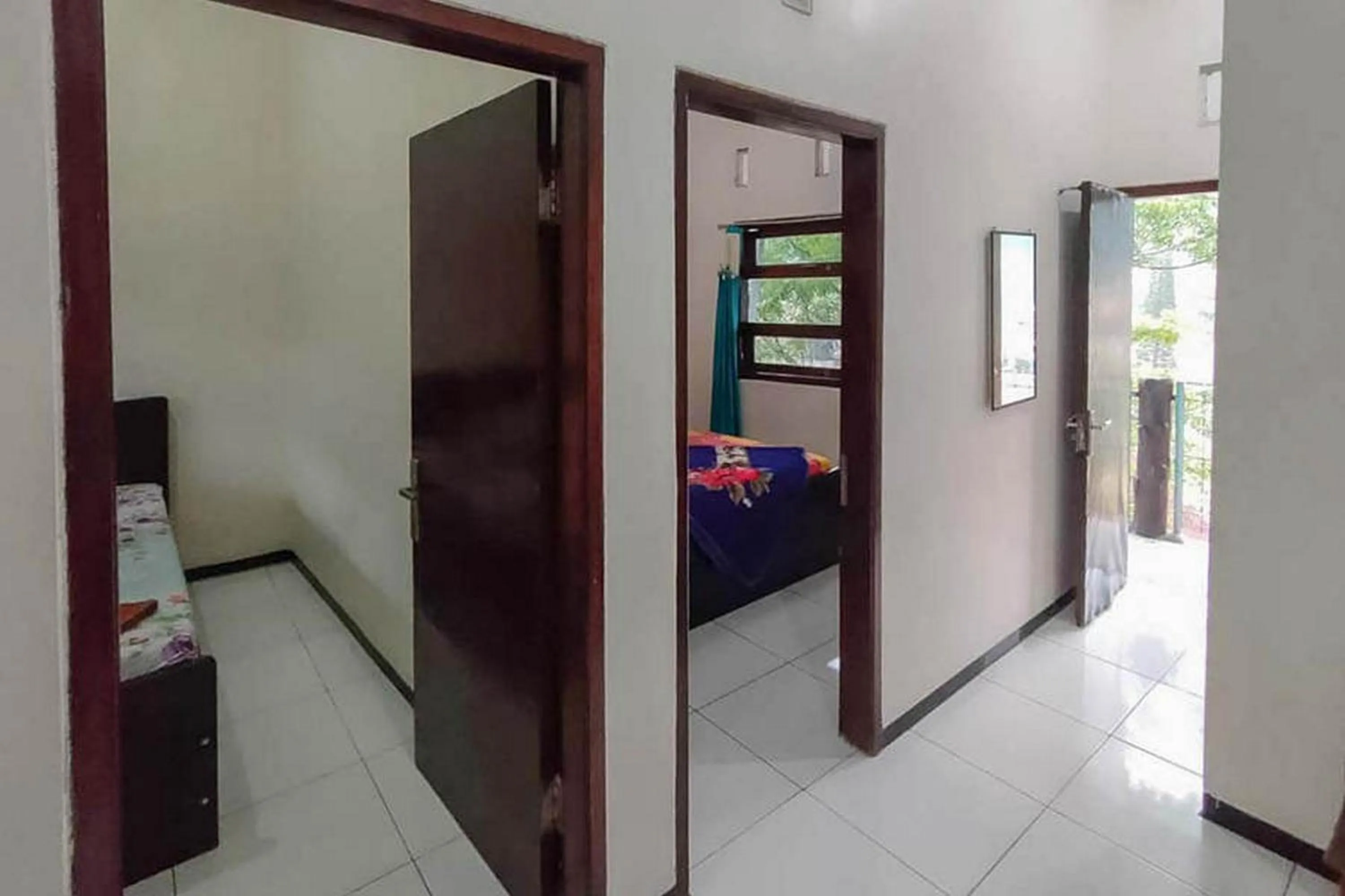 Bed in Villa Ghazani 4 at Desa Wisata Songgokerto