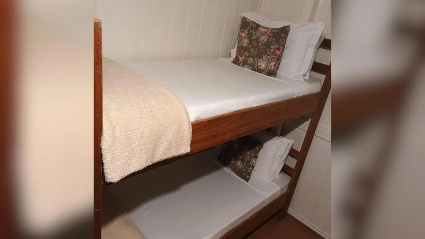 Bed in Villa Chalés Gramado - OH HOTÉIS