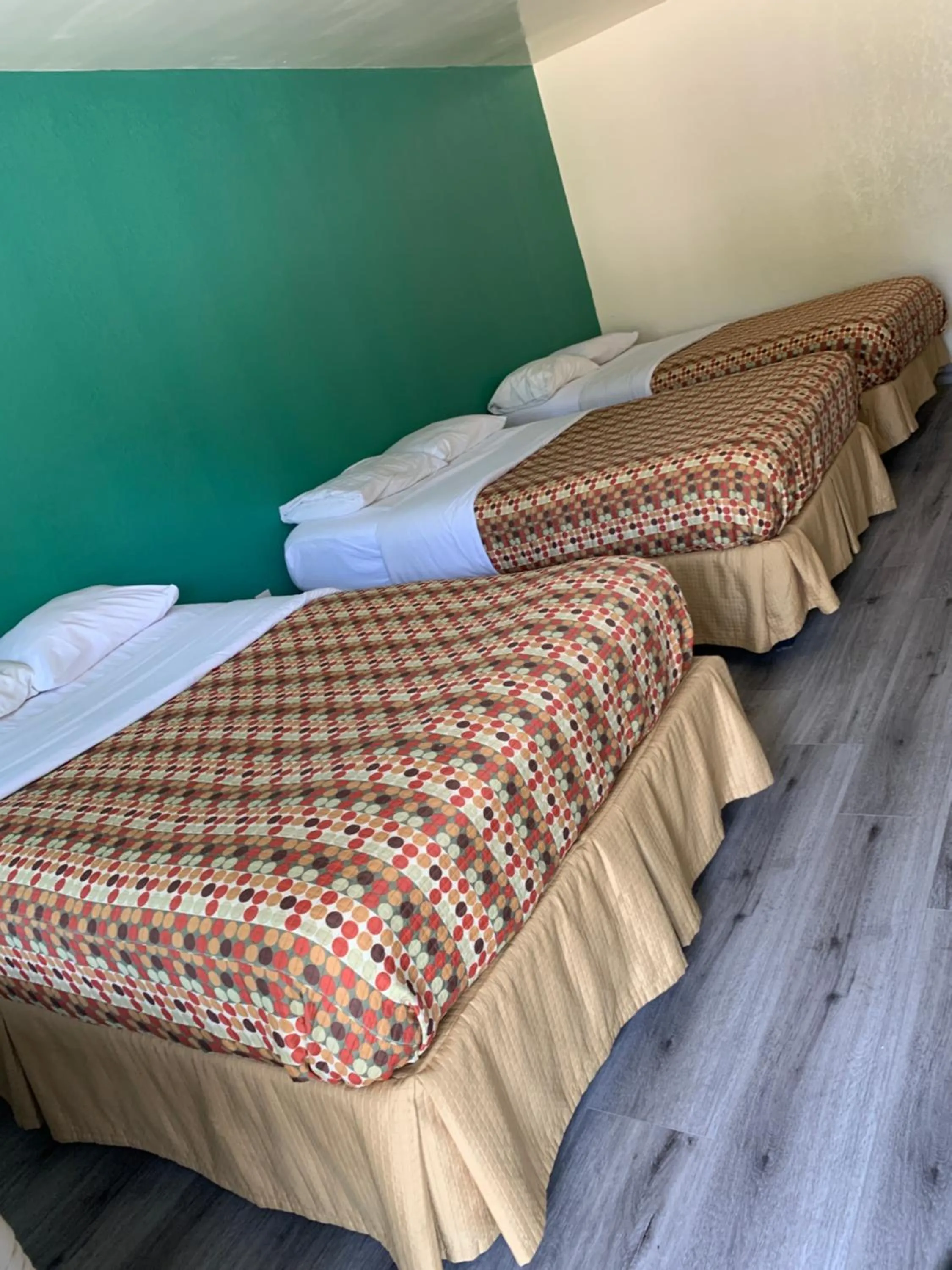 Bed in Green Garden Inn